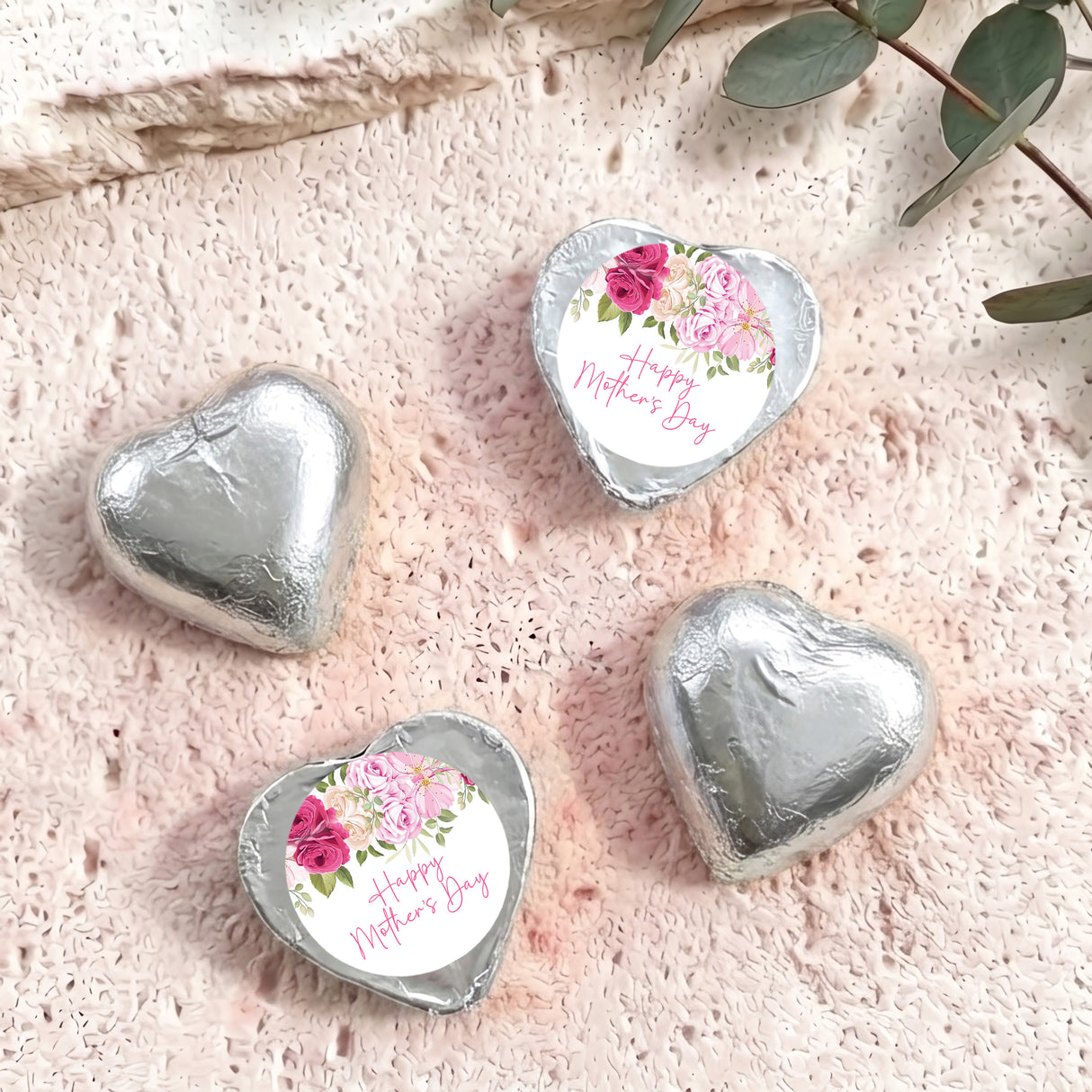 Silver foil-covered heart chocolates with floral 'Happy Mother's Day' message