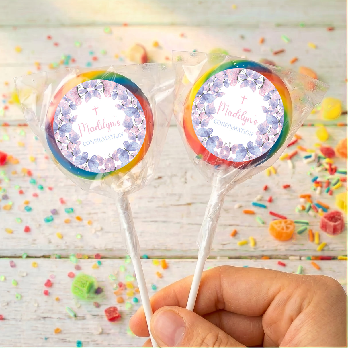 Butterfly-themed confirmation lollipops with multicolor ribbon bows and round printed labels
