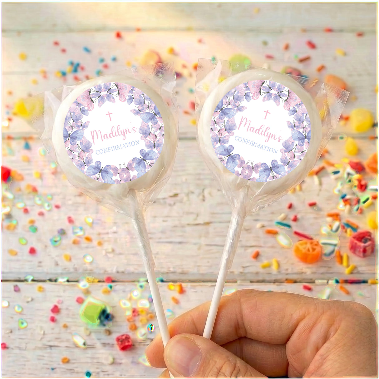 Butterfly-themed confirmation lollipops with clear wrapper and round printed labels