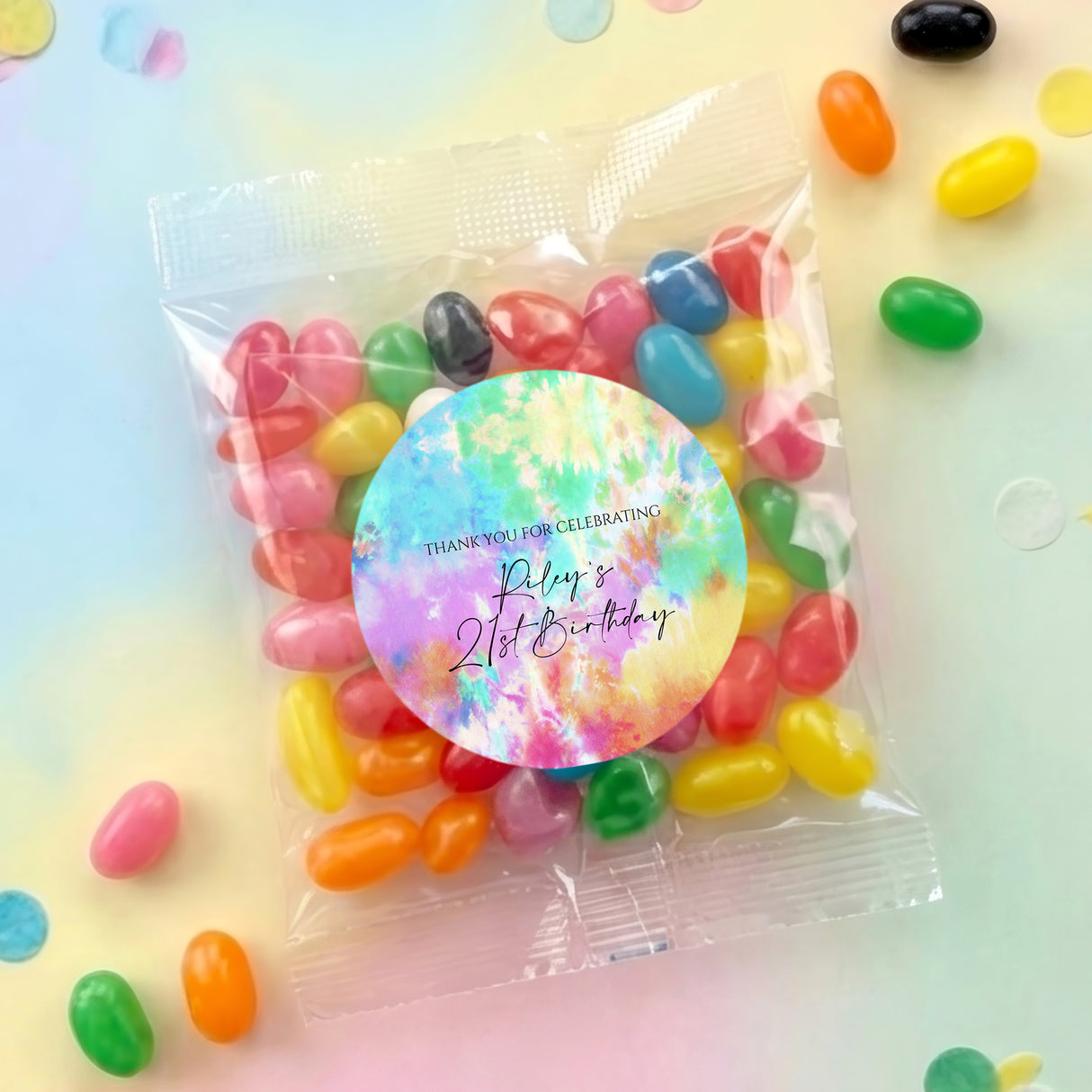 Personalised tie-dye jelly bean bag with multicolor candies and round birthday label