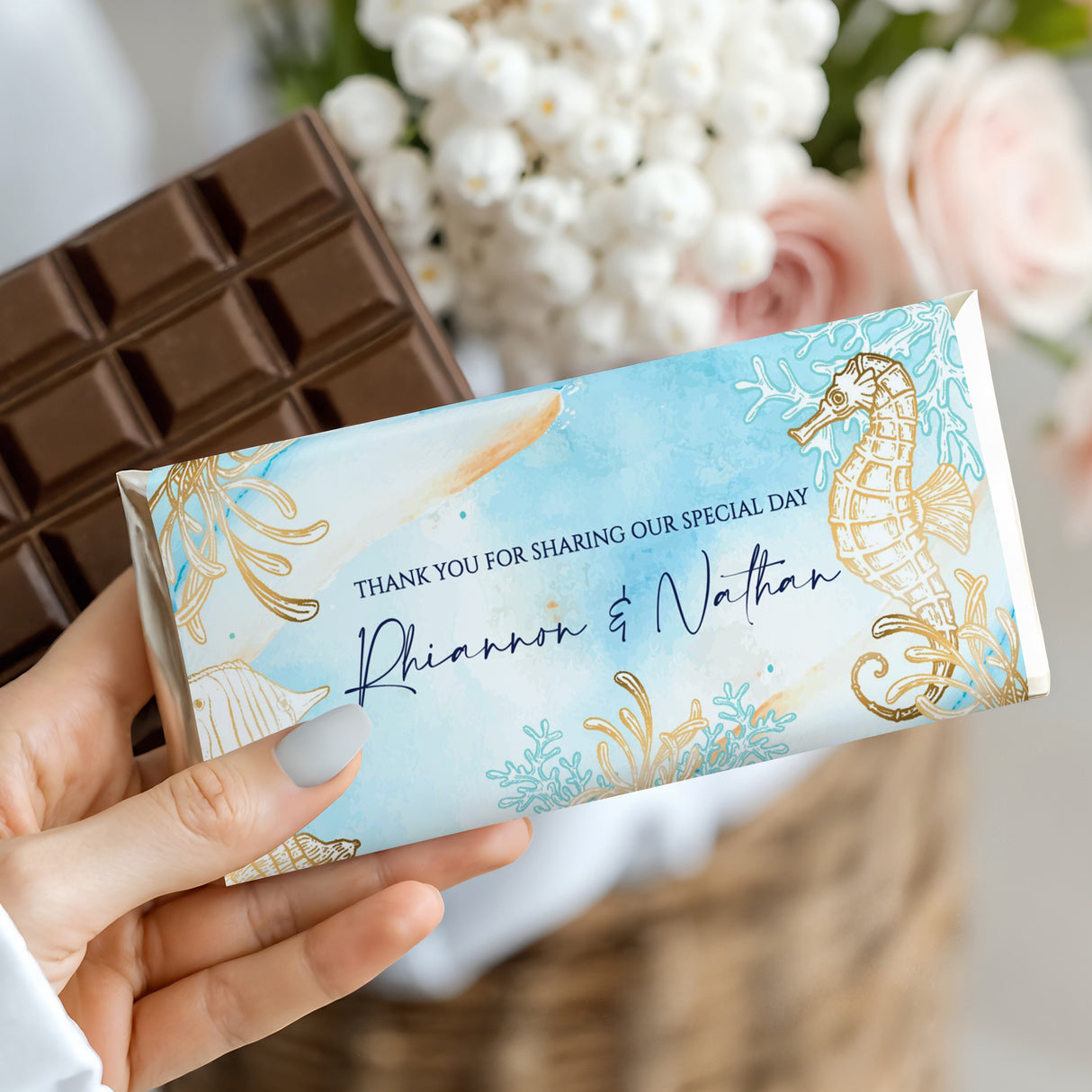 Ocean-themed wedding chocolate bar with blue watercolor and gold seahorse foil wrapper