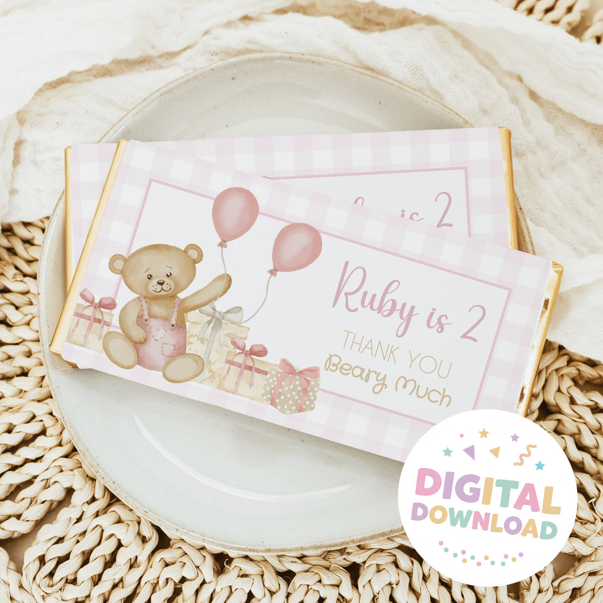 Chocolate bar wrapper with teddy bear, balloons, pink 'Ruby is 2' and 'Thank you' text