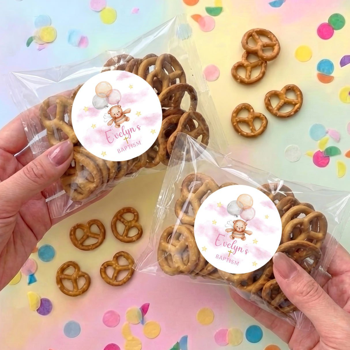 Personalised pretzel snack bags with brown pretzels and round printed sticker labels