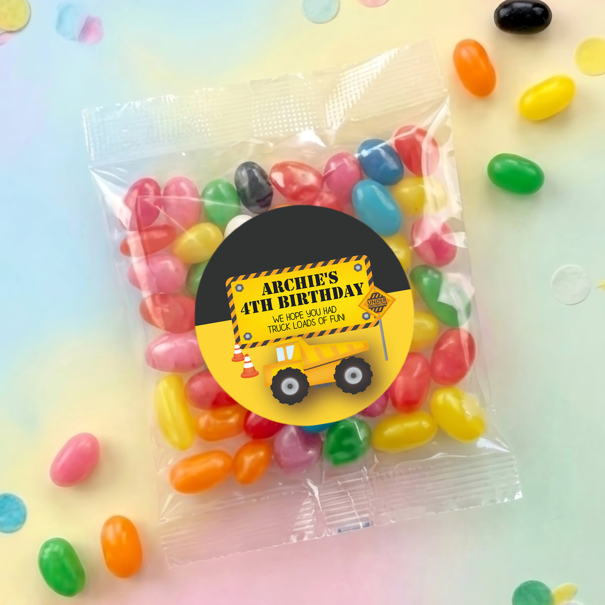Personalised jelly bean bag with mixed-color sweets and round birthday truck label