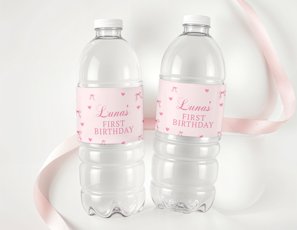 Personalised water bottle labels with pink hearts and bow, 'First Birthday'
