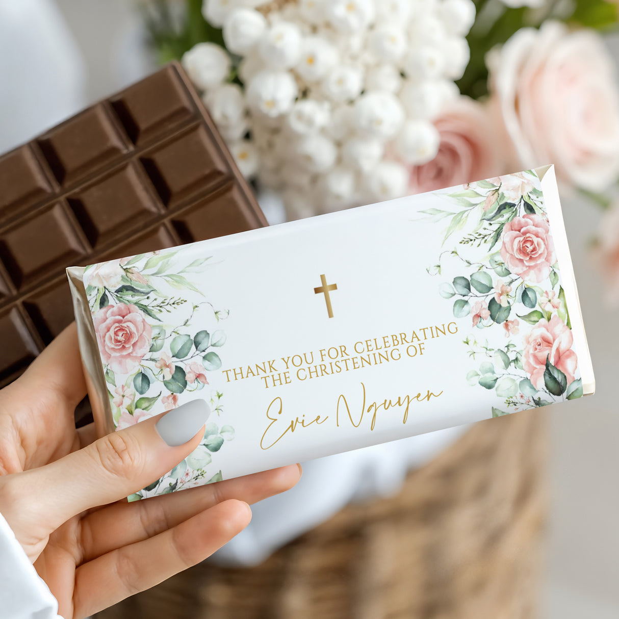 Christening chocolate bar wrapper: white roses, green leaves, gold cross, "Ervie Nguyen"