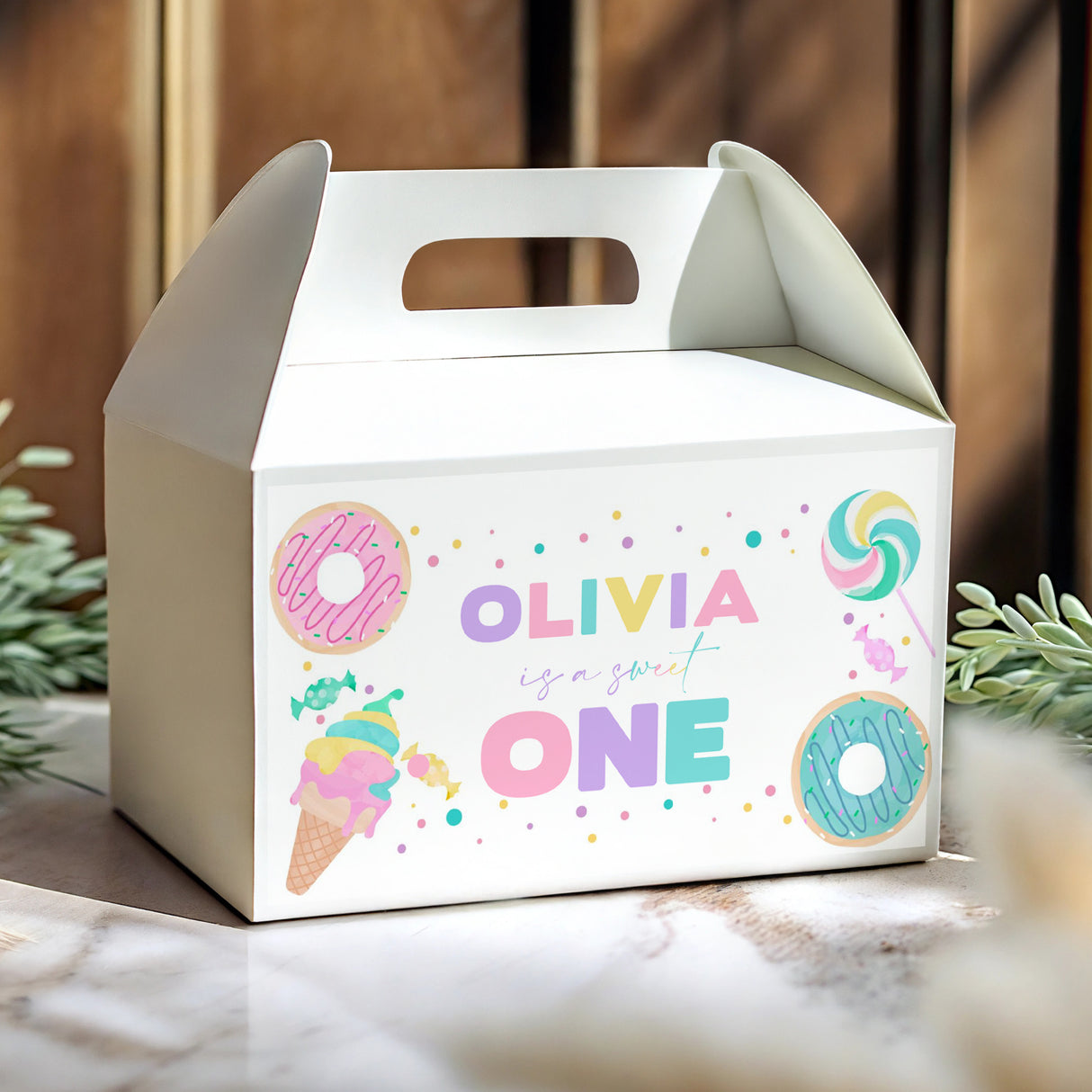 White gable favour box with handle cutout, colourful Olivia is one graphics