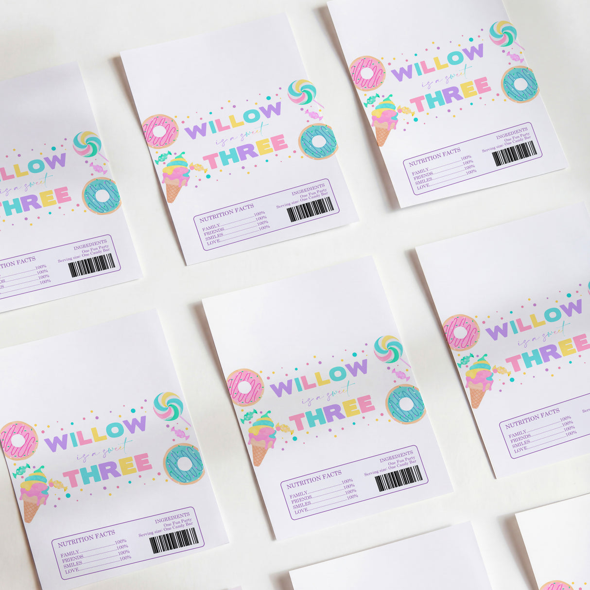 Birthday chocolate wrappers with colorful “Willow Three” donut graphic and multicolor accents