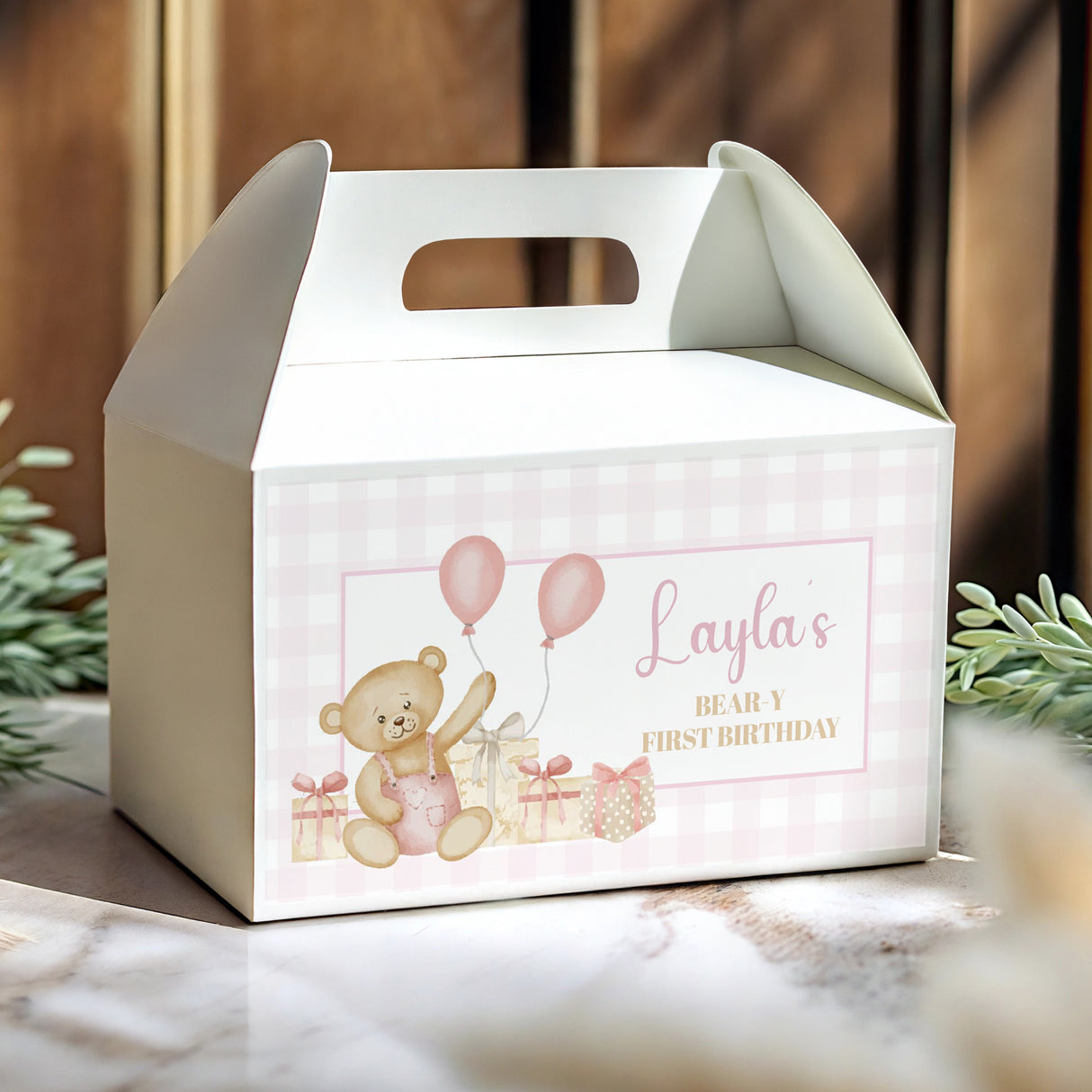 Pink gingham favour box with teddy bear, balloons, handle; 'Layla's'.