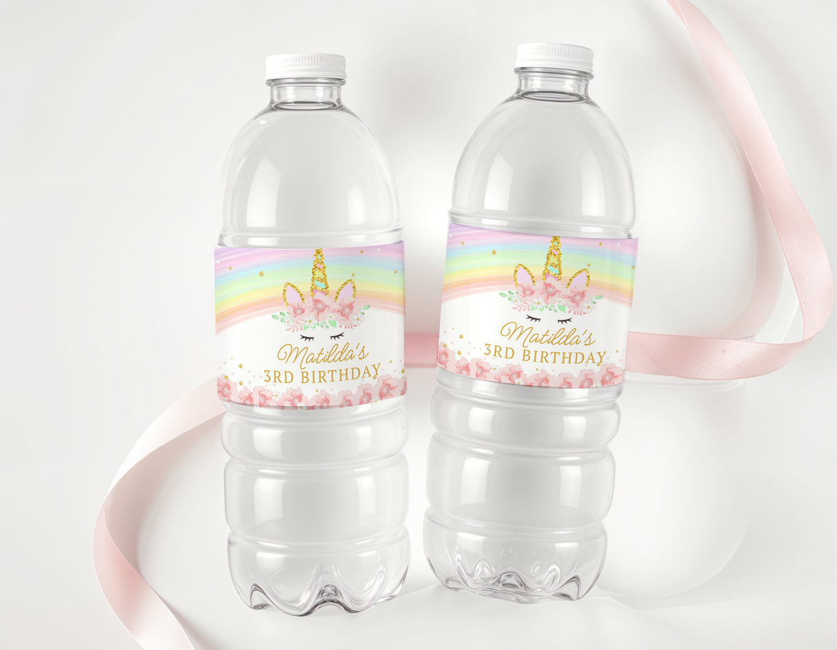 Clear water bottles with rainbow unicorn 3rd birthday labels for Matilda