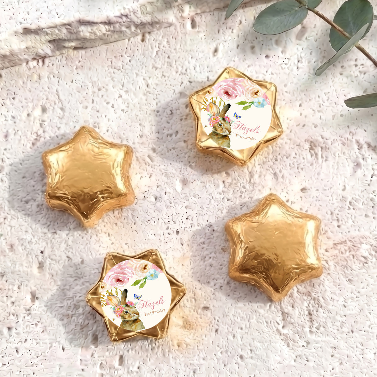 Gold foil star chocolates with floral bunny birthday label wrap