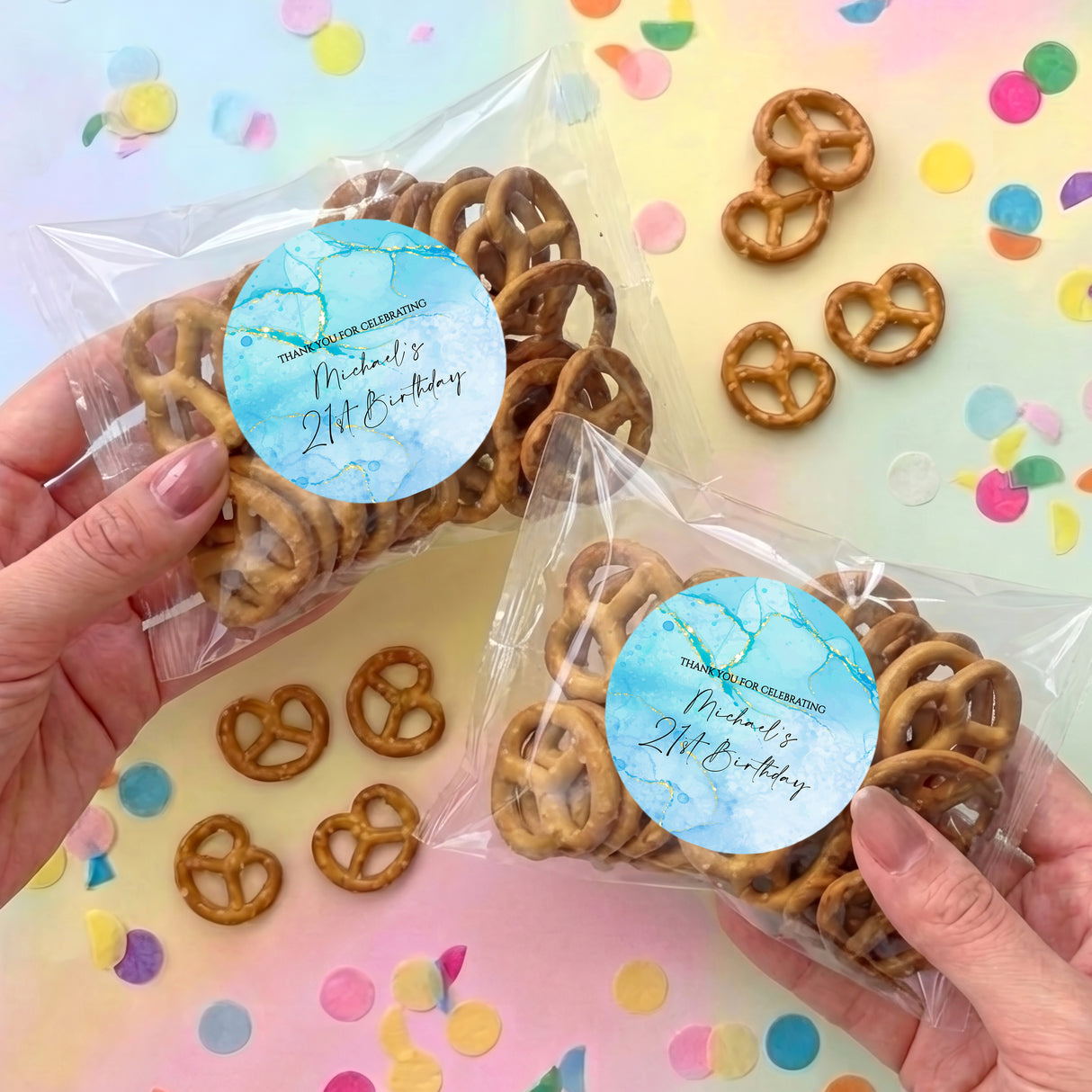 Personalized pretzel snack bag with pretzels and a blue round sticker.