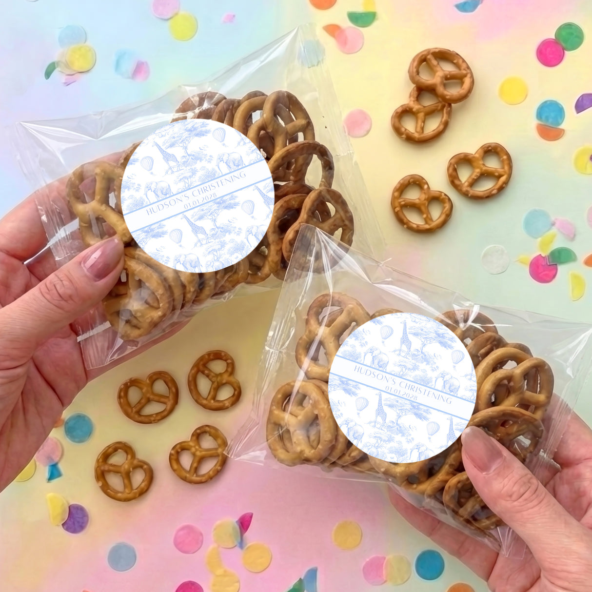 Christening personalised pretzel bag with clear wrap and round label, holding mini pretzels