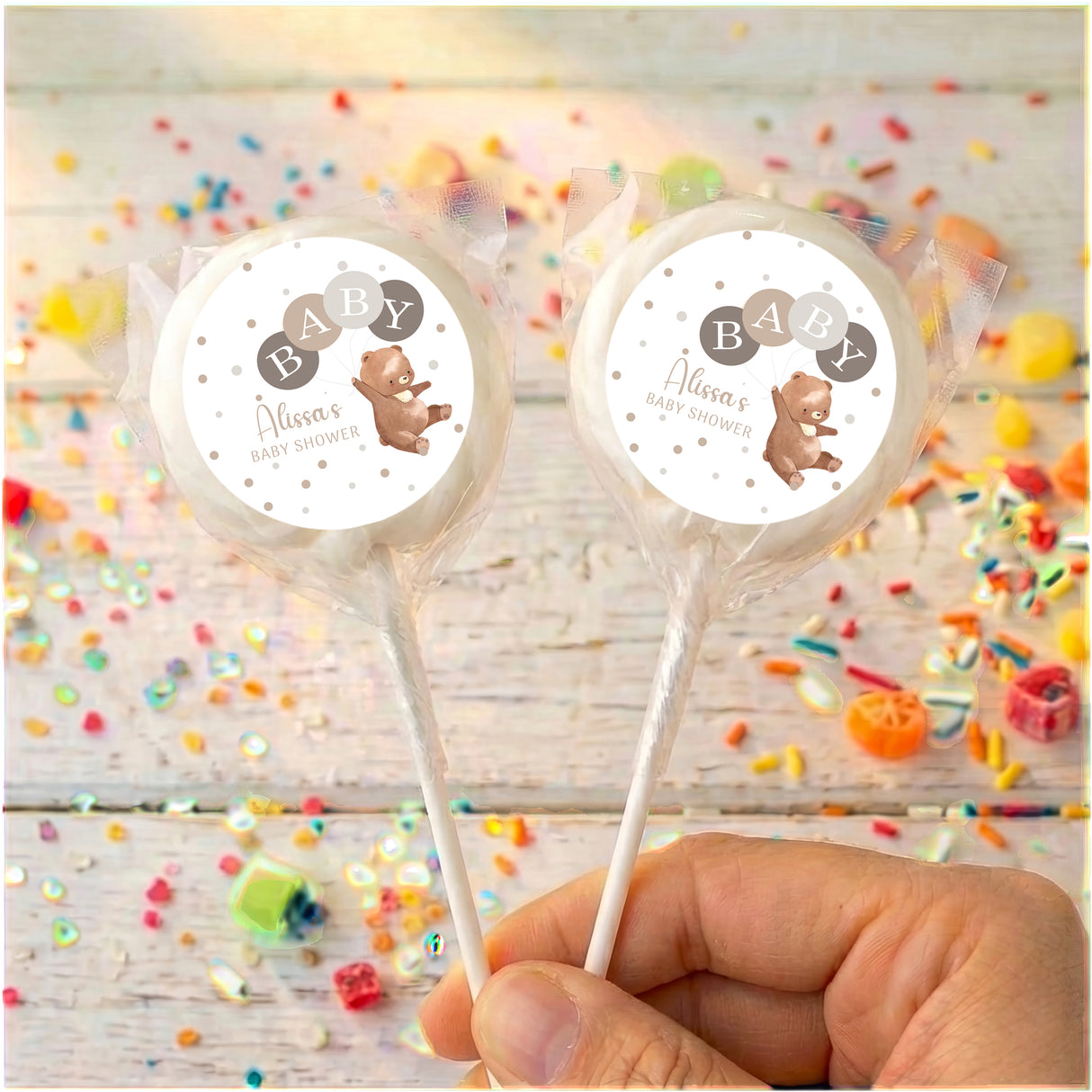 Baby shower personalised lollipops with white bear label, clear wrapper, plain sticks