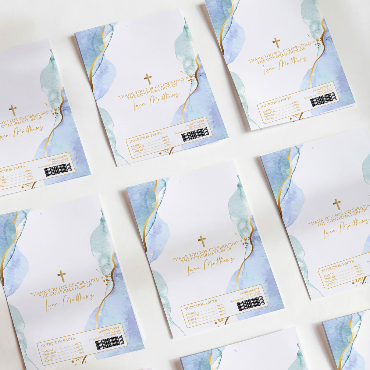 Blue and gold watercolor chocolate wrappers, folded with cross and blank label lines