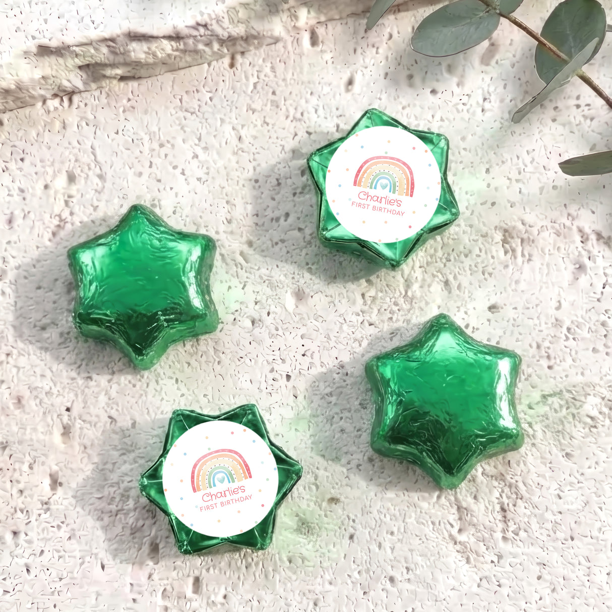 Foil chocolate stars with green and white rainbow label