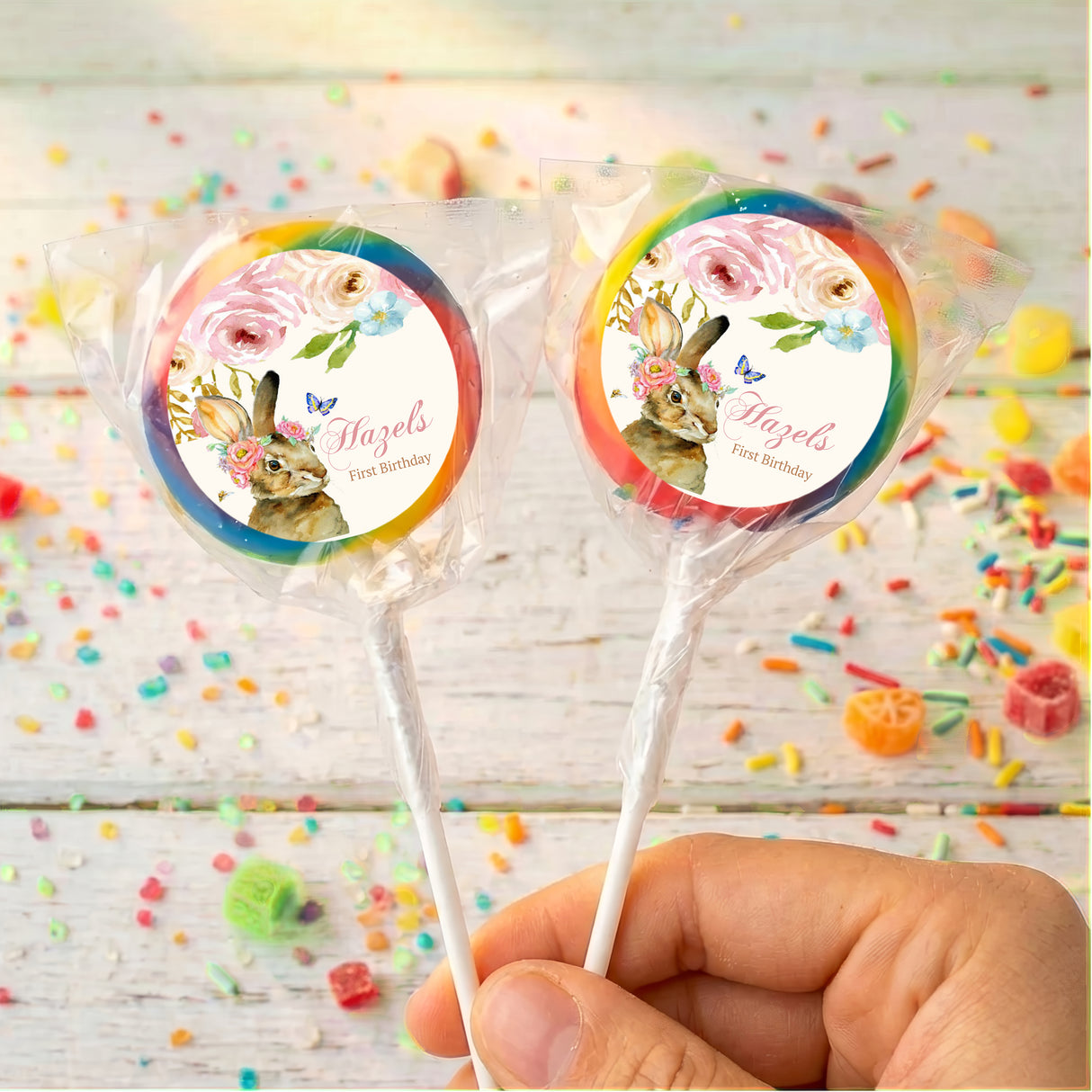 Personalised bunny floral lollipops with orange and blue bordered round labels
