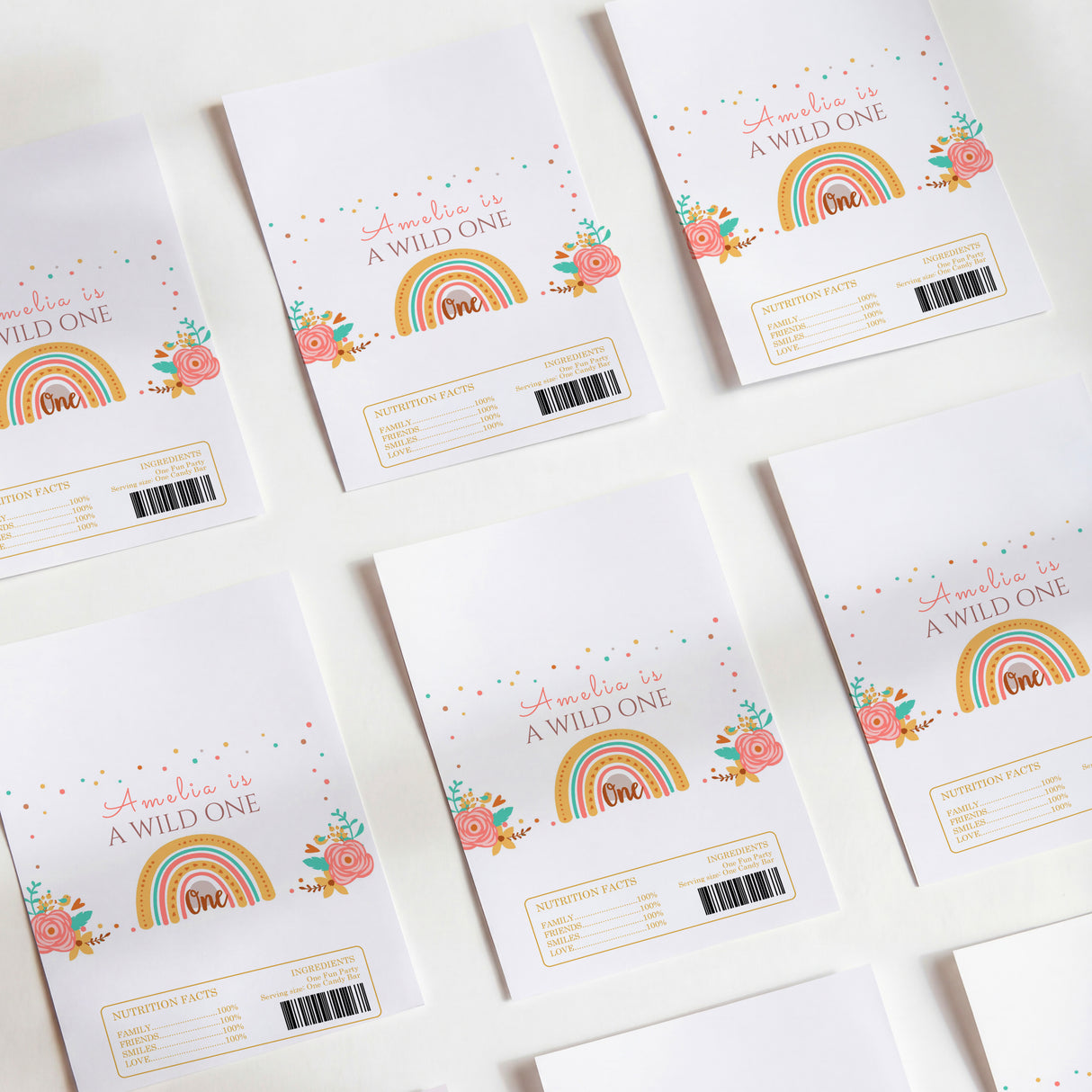 First birthday chocolate wrappers with rainbow 'A Wild One' and floral accents