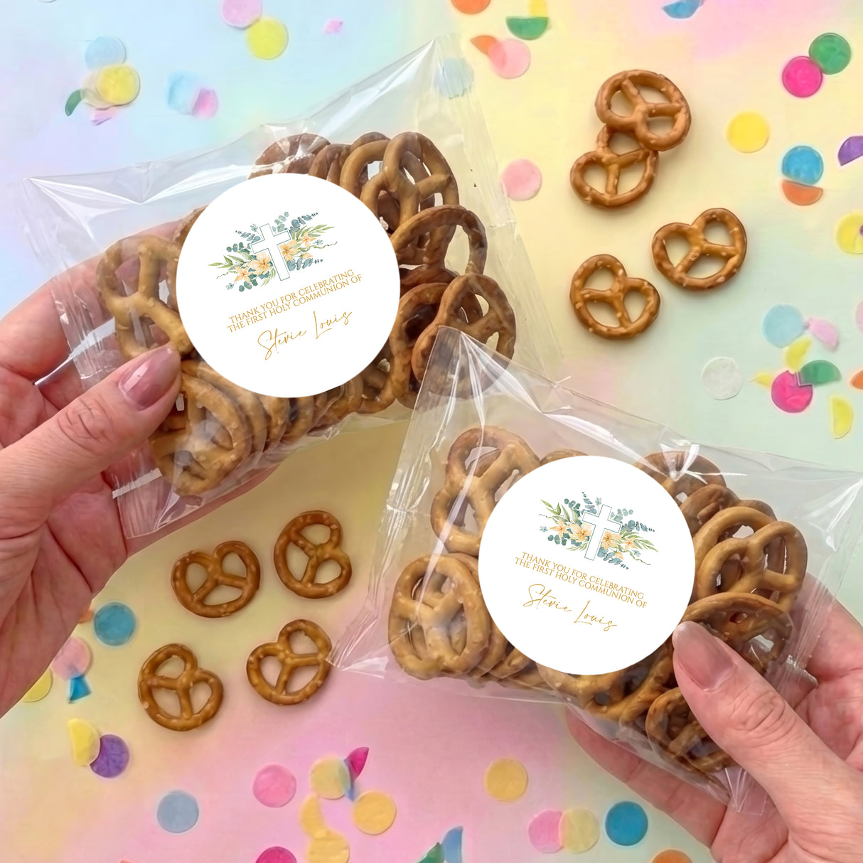 Personalised pretzel bag with pretzels inside and round First Communion cross floral sticker