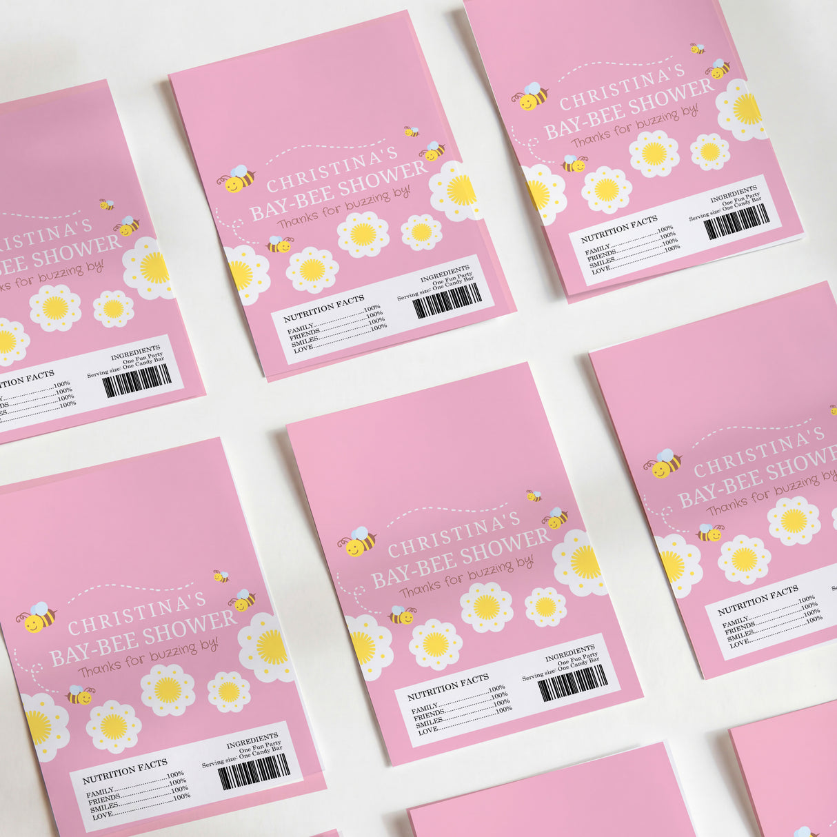 Pink printed chocolate wrapper sheets with bee and flower design and nutrition panel