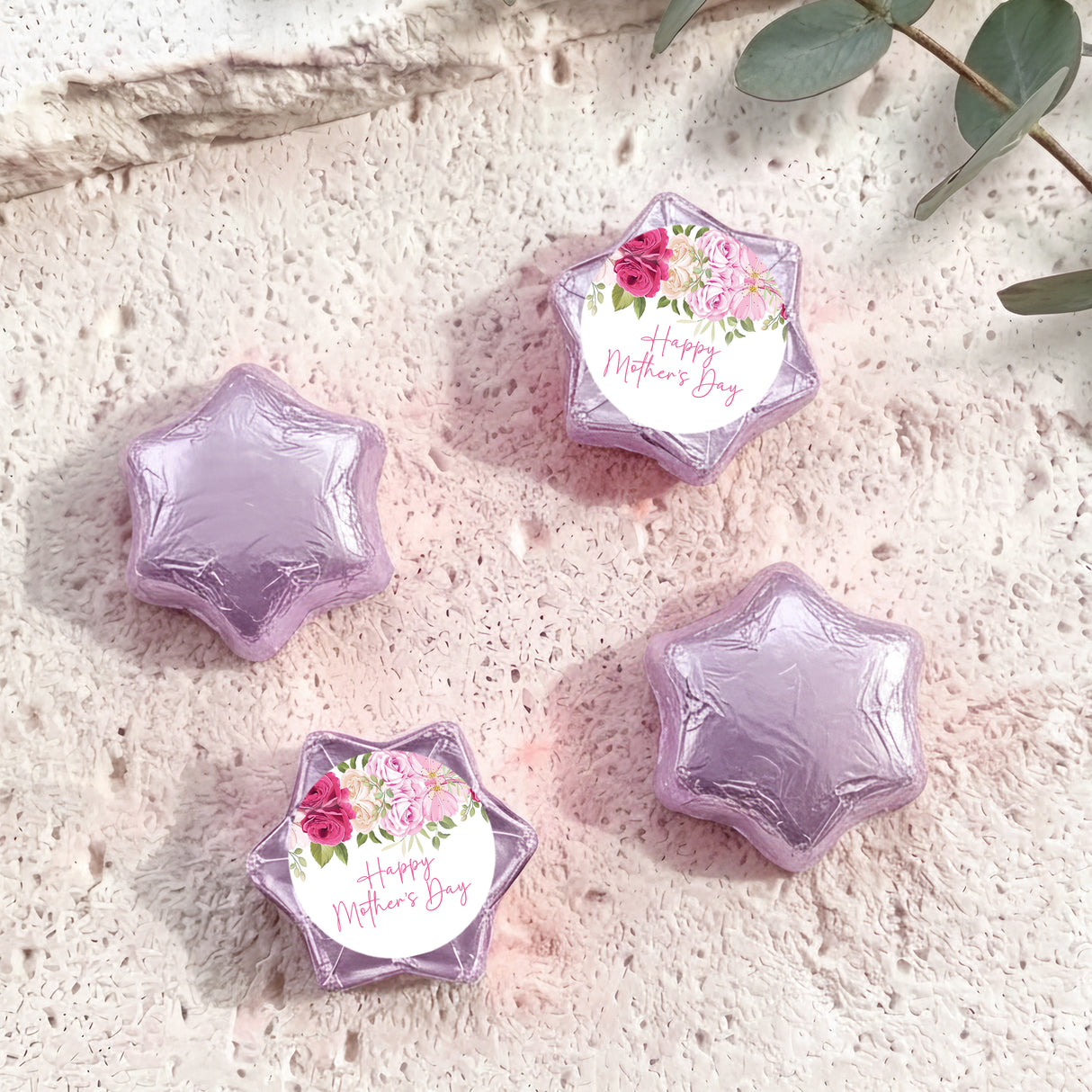 Foil-covered lavender chocolate stars, one with floral 'Happy Mother's Day' label