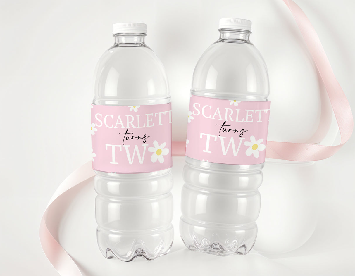 Clear plastic water bottles with pink daisy birthday labels: 'Scarlet turns TW'