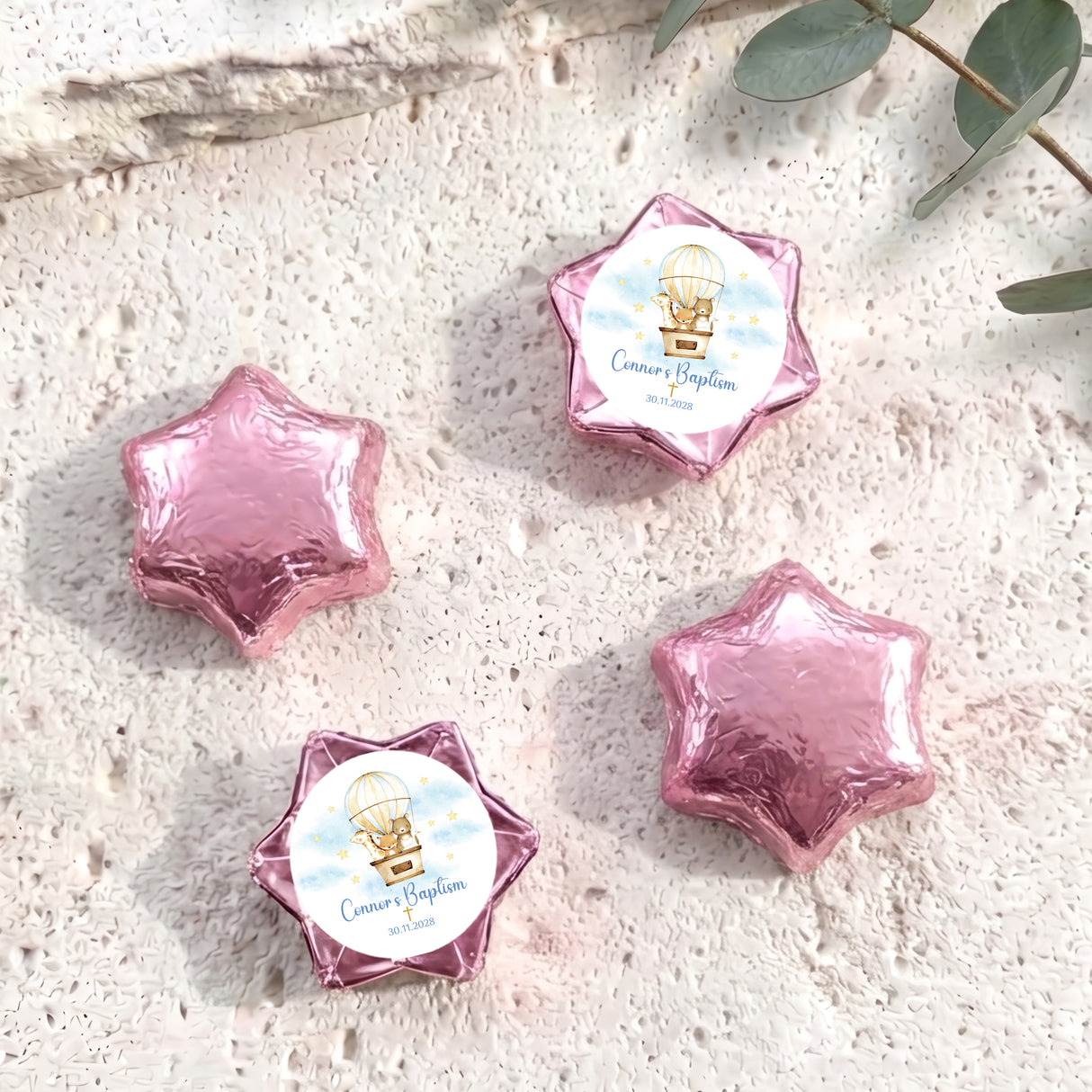 Set of five purple star-shaped foil chocolates with baptism label and balloon motif