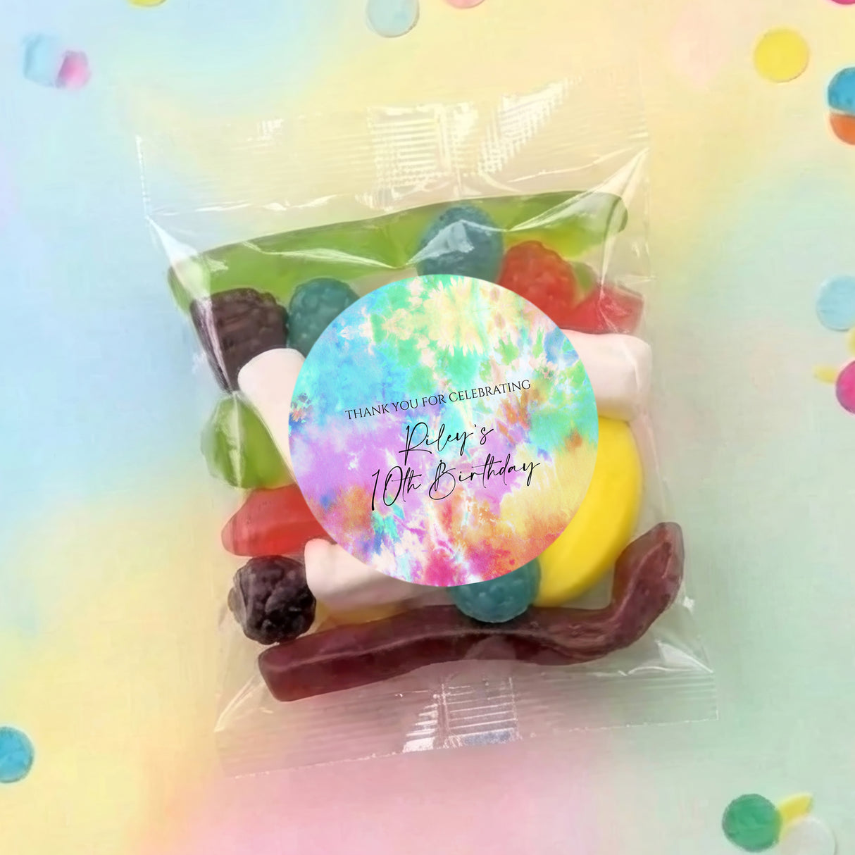 Clear lolly bag with tie-dye round sticker for 10th birthday and assorted sweets