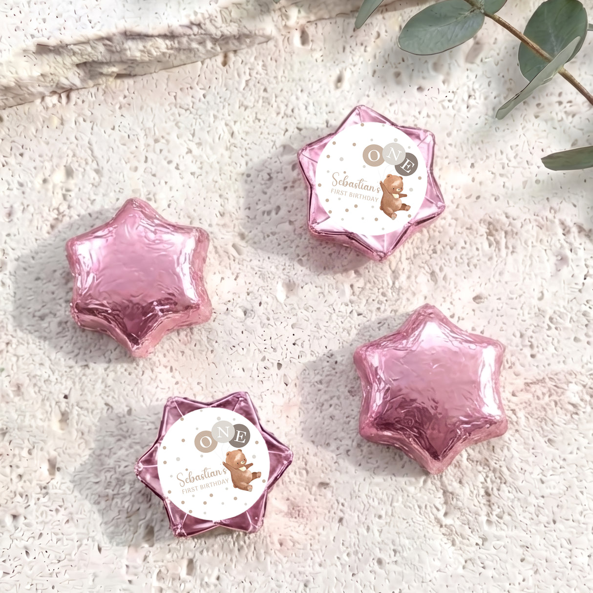 Pink foil star balloons with personalised bear card and “ONE”
