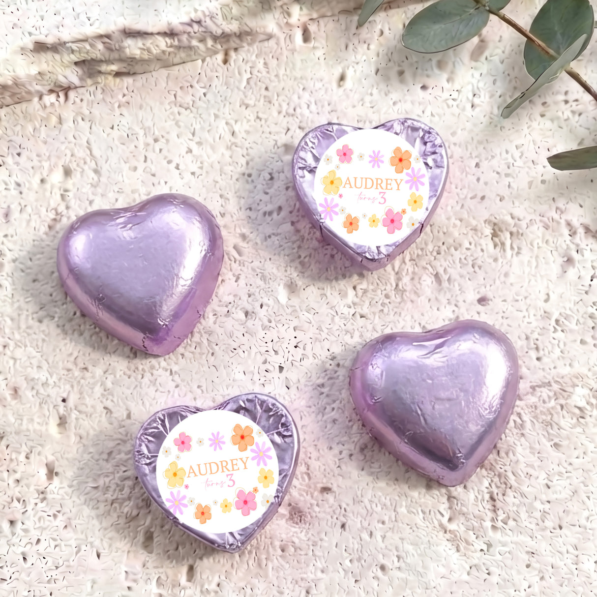 Foil-covered lavender chocolate hearts with floral label reading AUDREY 3