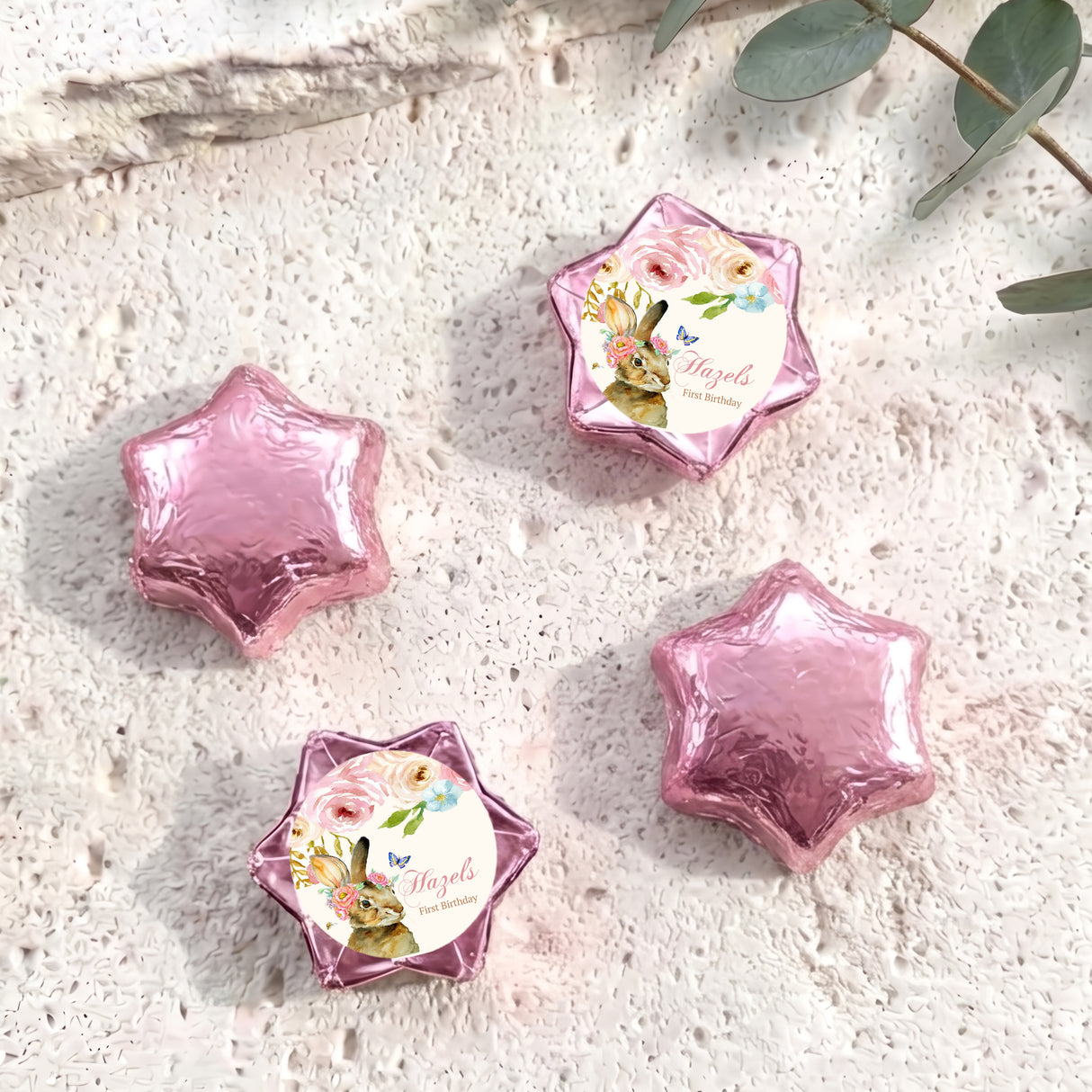 Pink foil star chocolates with floral bunny birthday label wrap