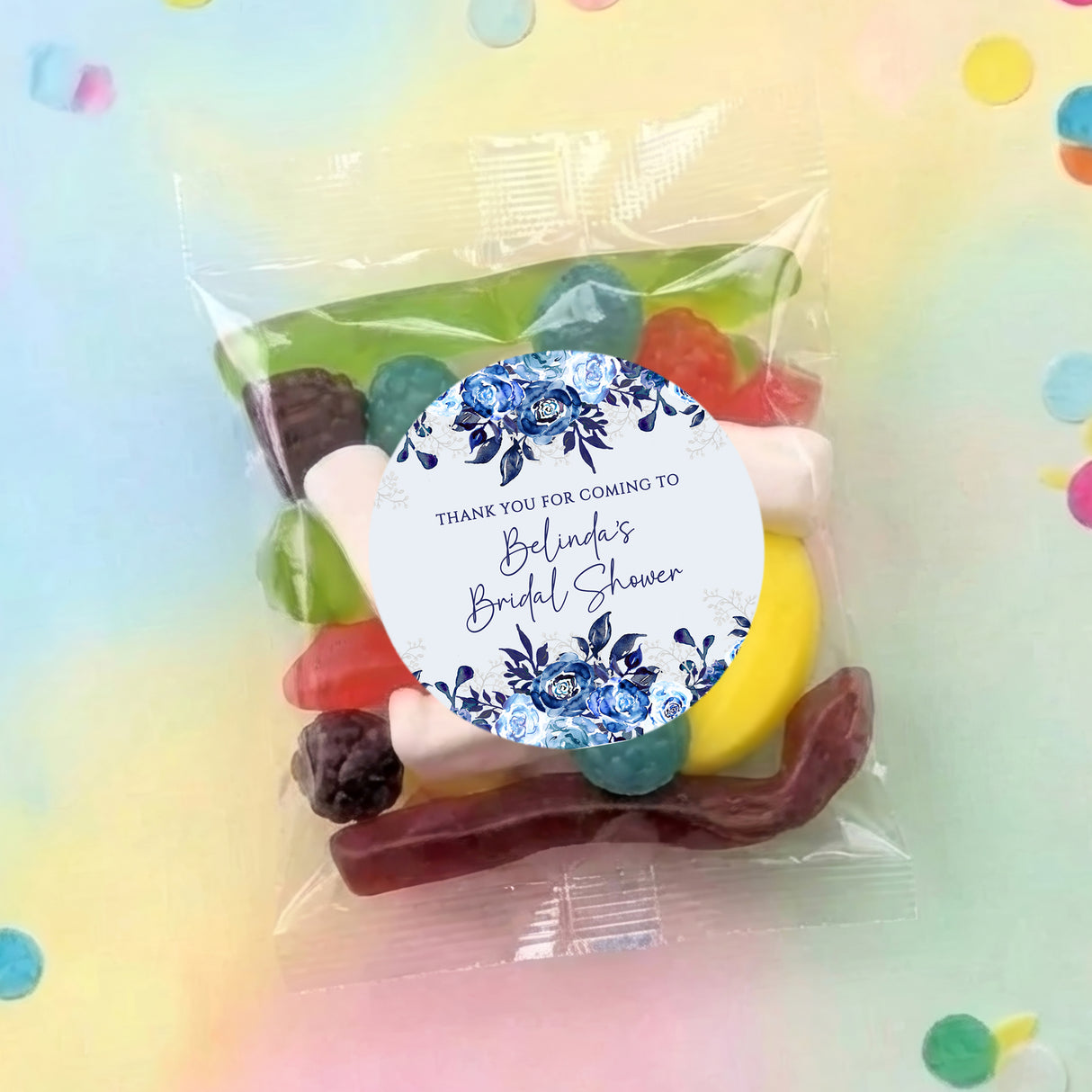 Bridal shower lolly bag with clear wrap and blue floral round thank-you label