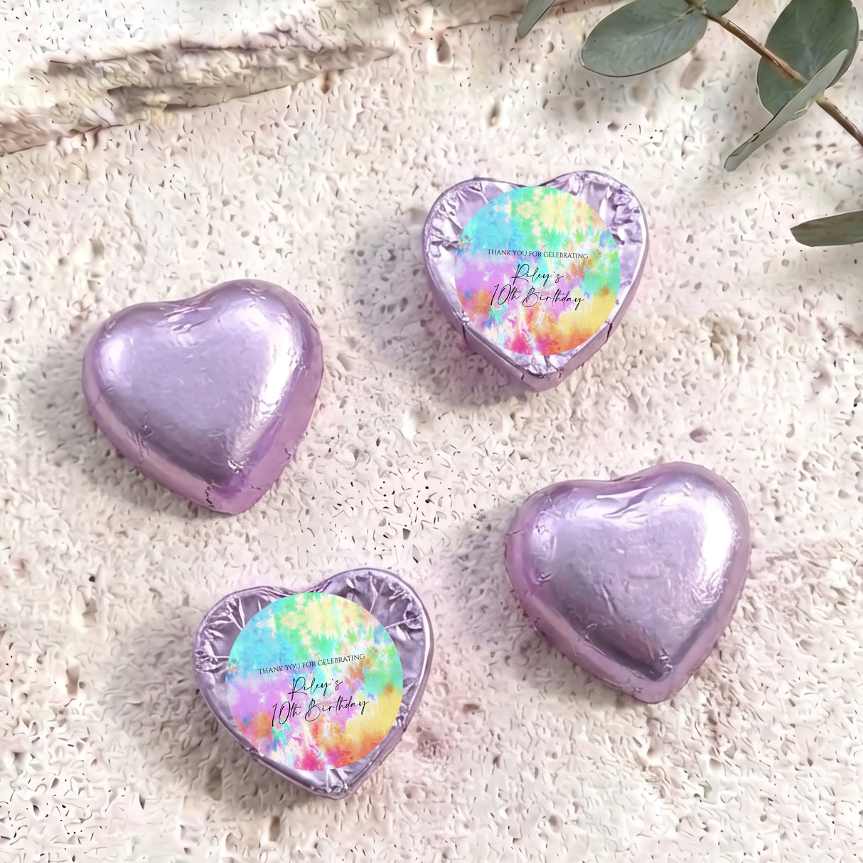 Lavender foil covered heart chocolates with colorful printed center