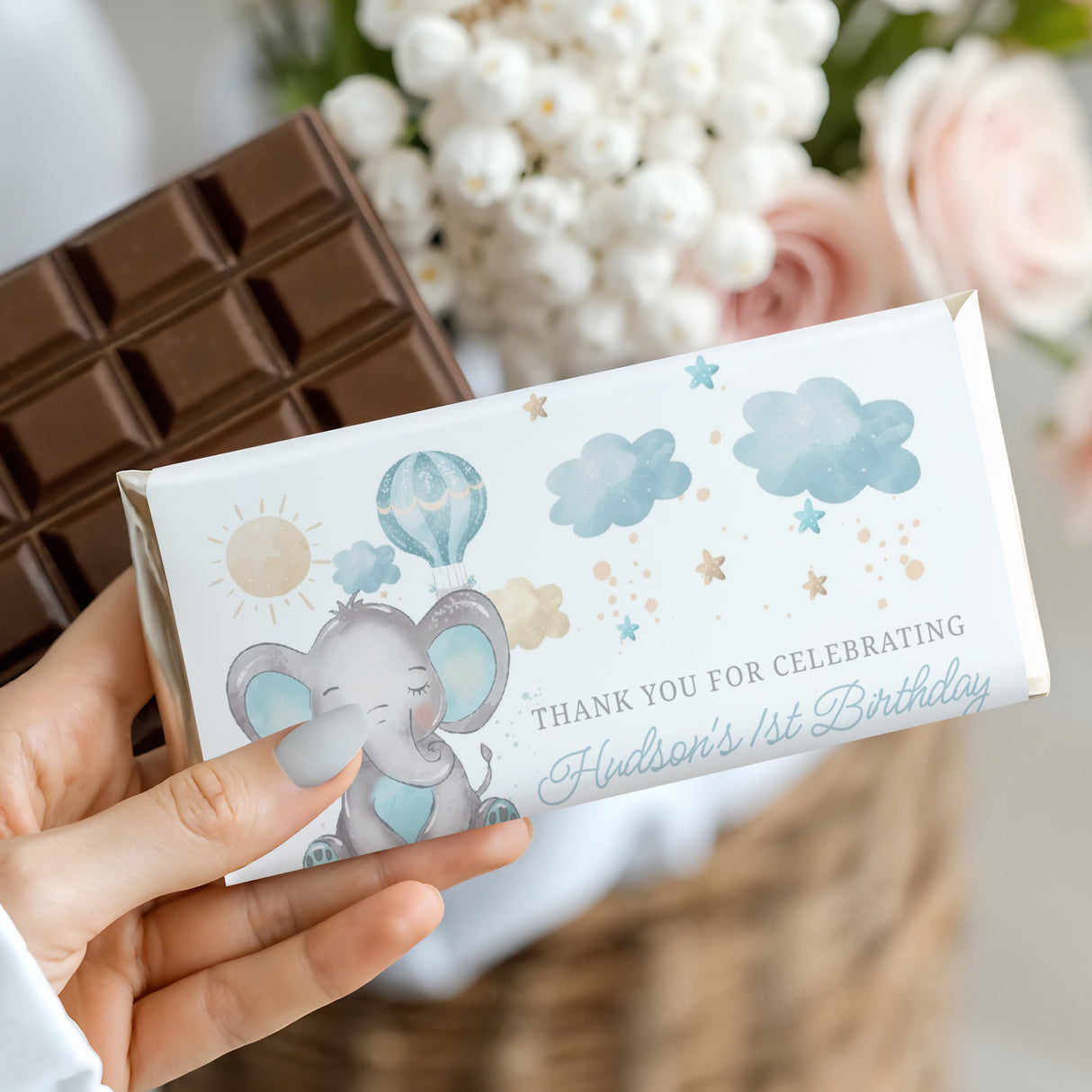 Custom first birthday chocolate bar wrapper with blue elephant and clouds, thank-you text