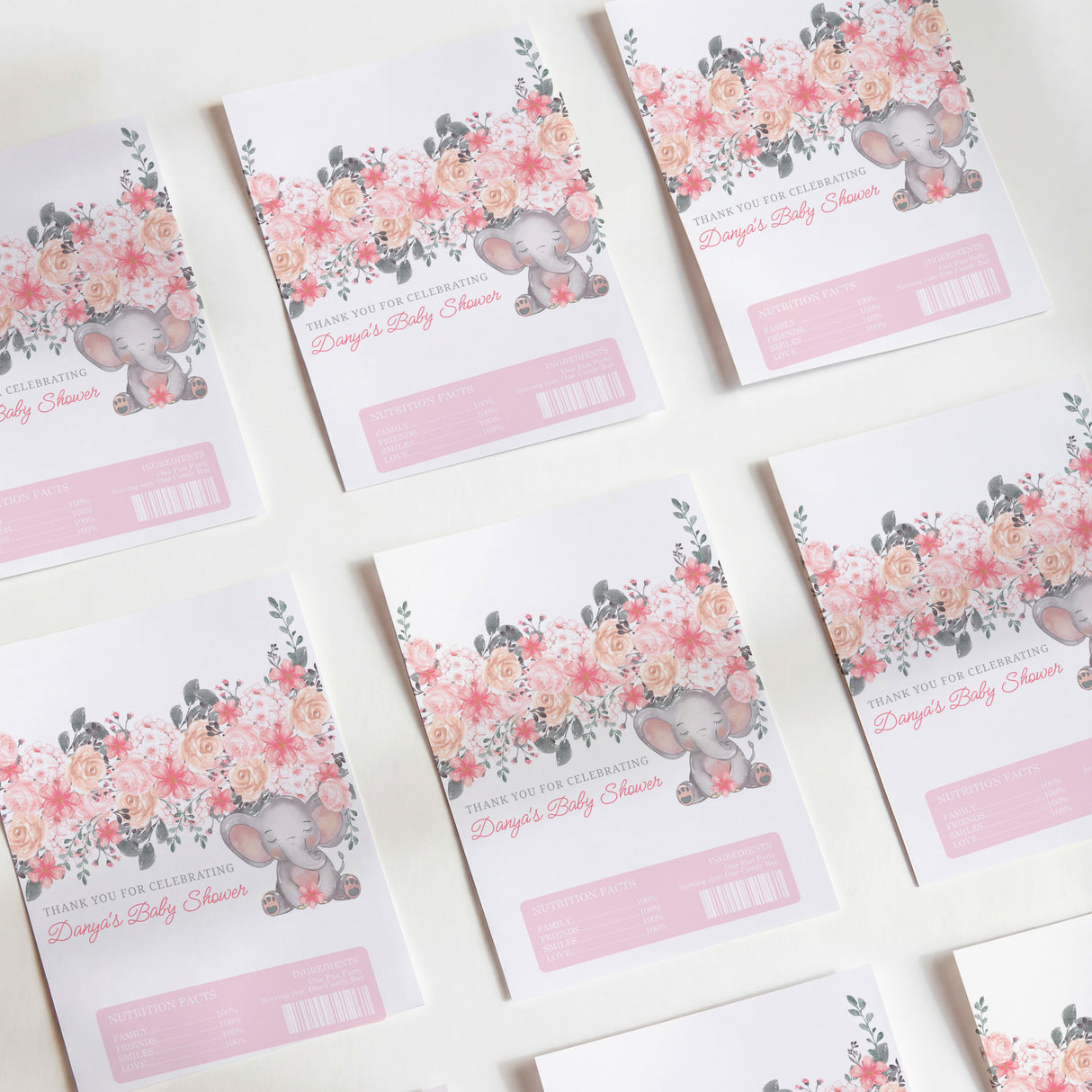 Pink floral elephant baby shower chocolate wrappers with printed message and barcode