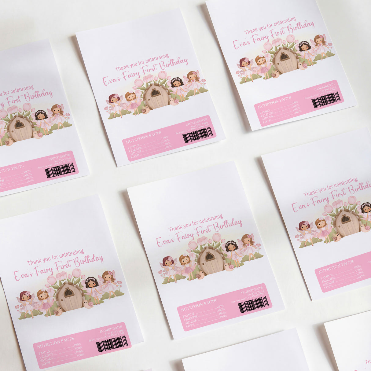 Pink fairy-themed first-birthday printed chocolate wrappers with barcodes and text