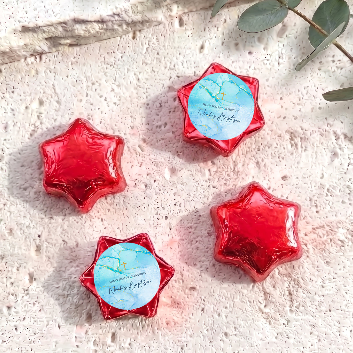 Personalised foil chocolate stars in red with baptism label and cross motif