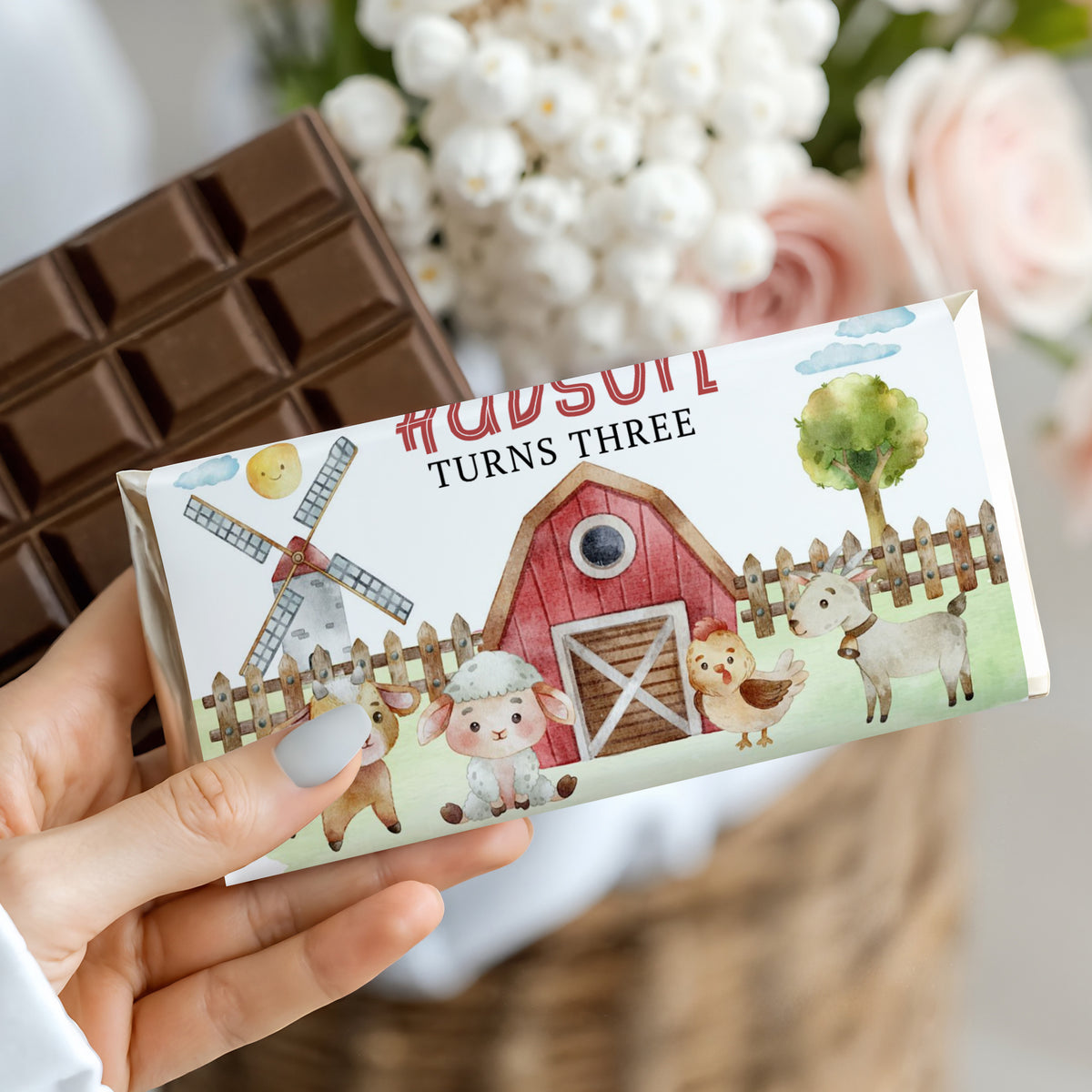 Chocolate bar with white farmyard wrapper, animals and windmill graphic
