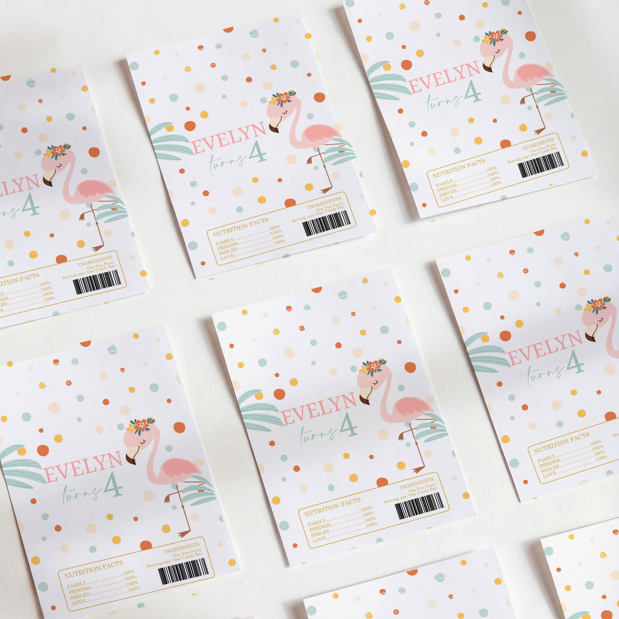 Printed white chocolate wrappers with flamingo, “EVELYN 4,” and barcode label