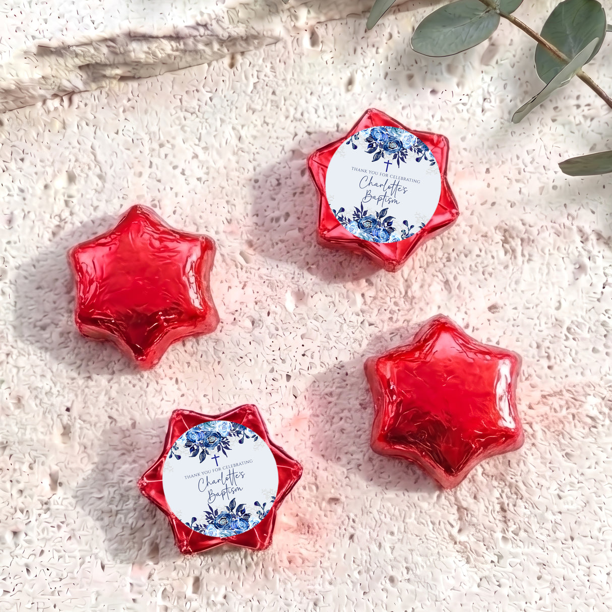 Baptism foil chocolate stars: blue floral thank-you label on red star