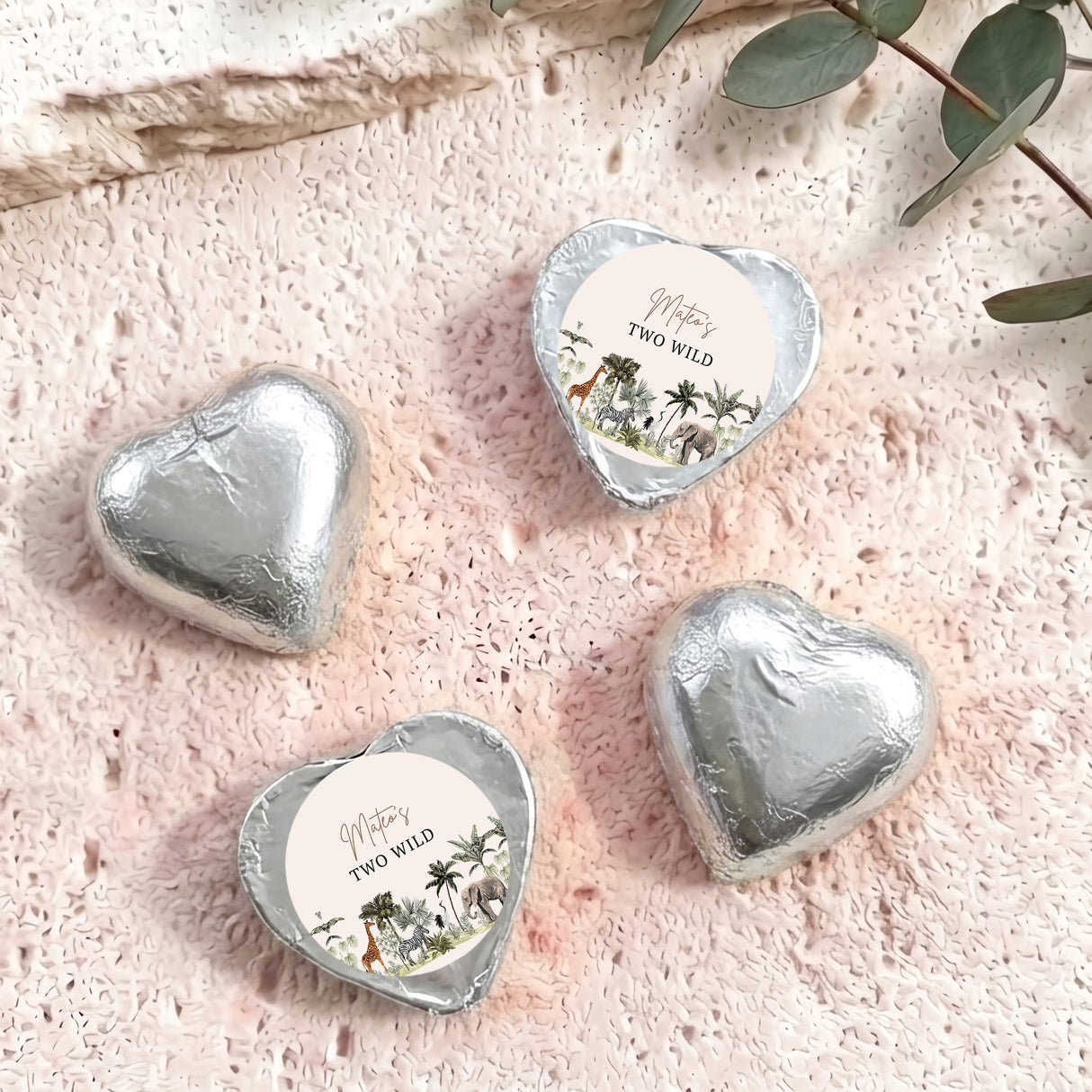 Silver foil chocolate hearts with “Two Wild” personalised round label