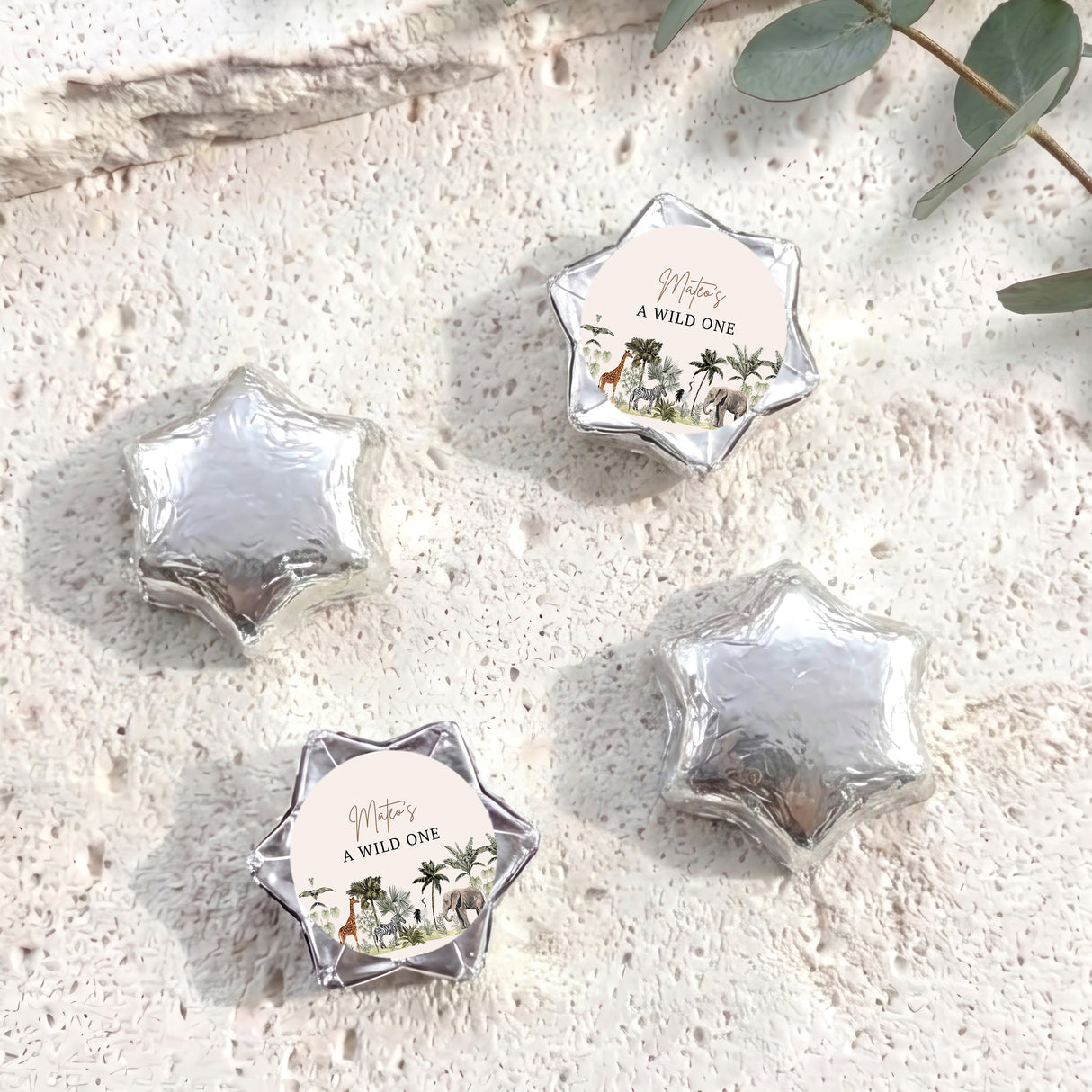 Silver foil-covered star chocolates with round "A Wild One" label