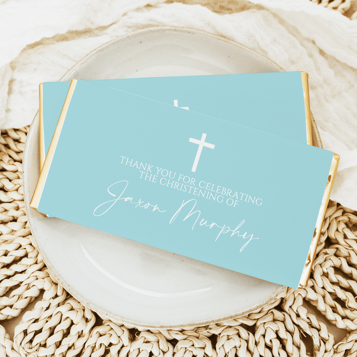 Light blue christening chocolate bar wrapper with cross and 'Thank you' text