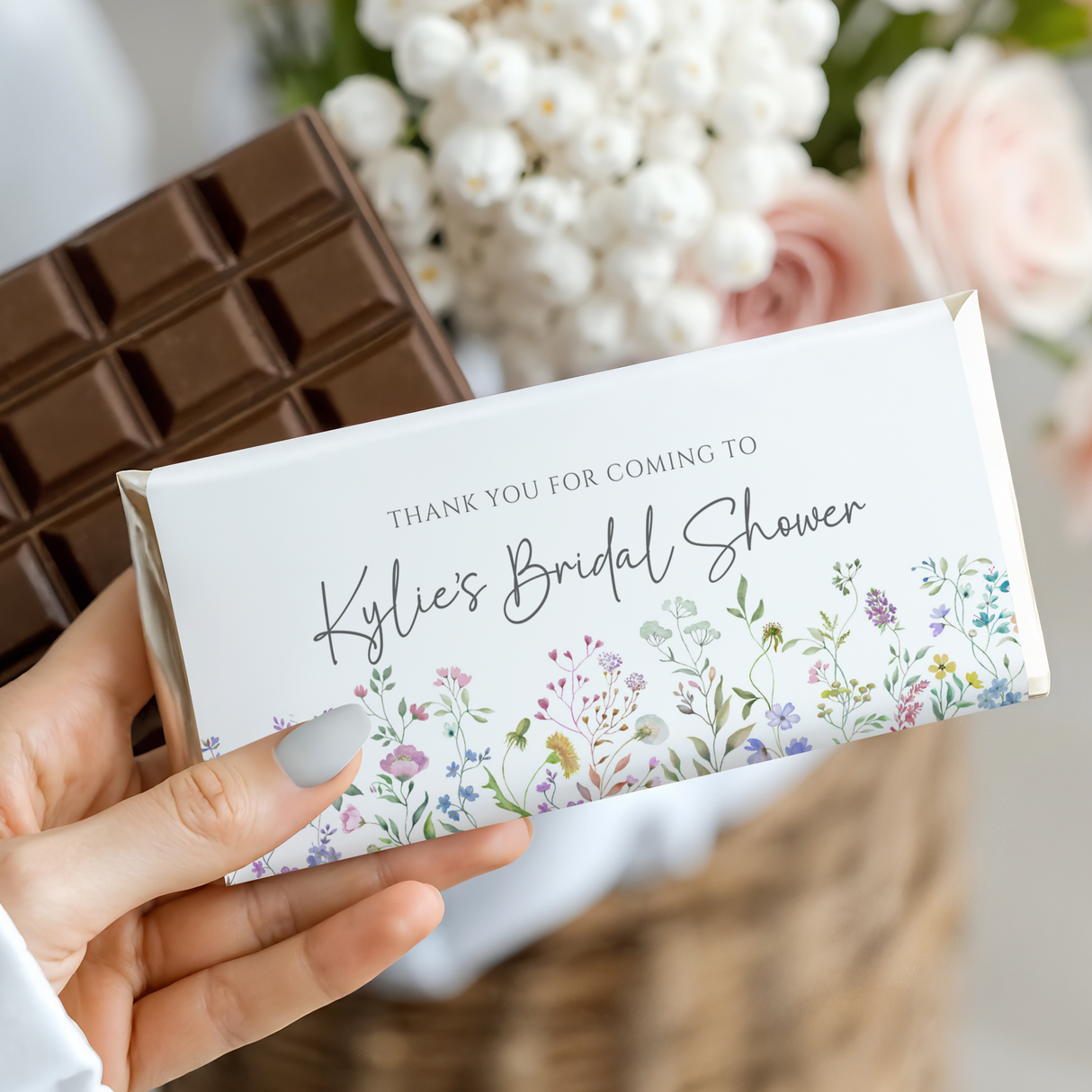Bridal shower chocolate bar with white wrapper, floral border, “Kylie’s Bridal Shower” text