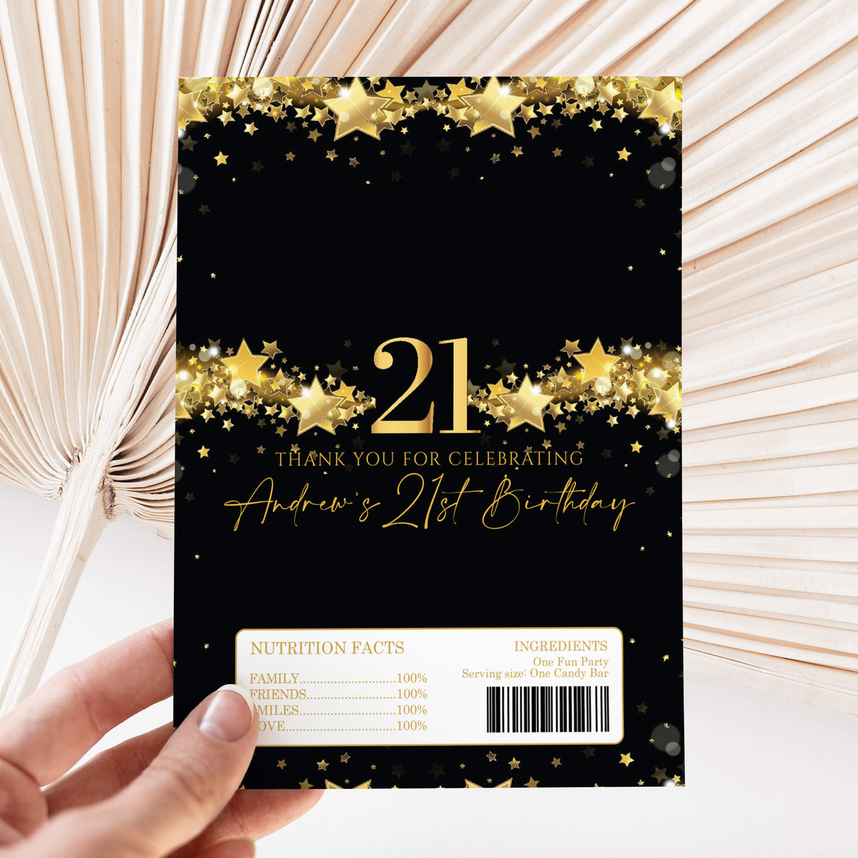 Black and gold 21st birthday chocolate wrapper with star pattern and 21 text