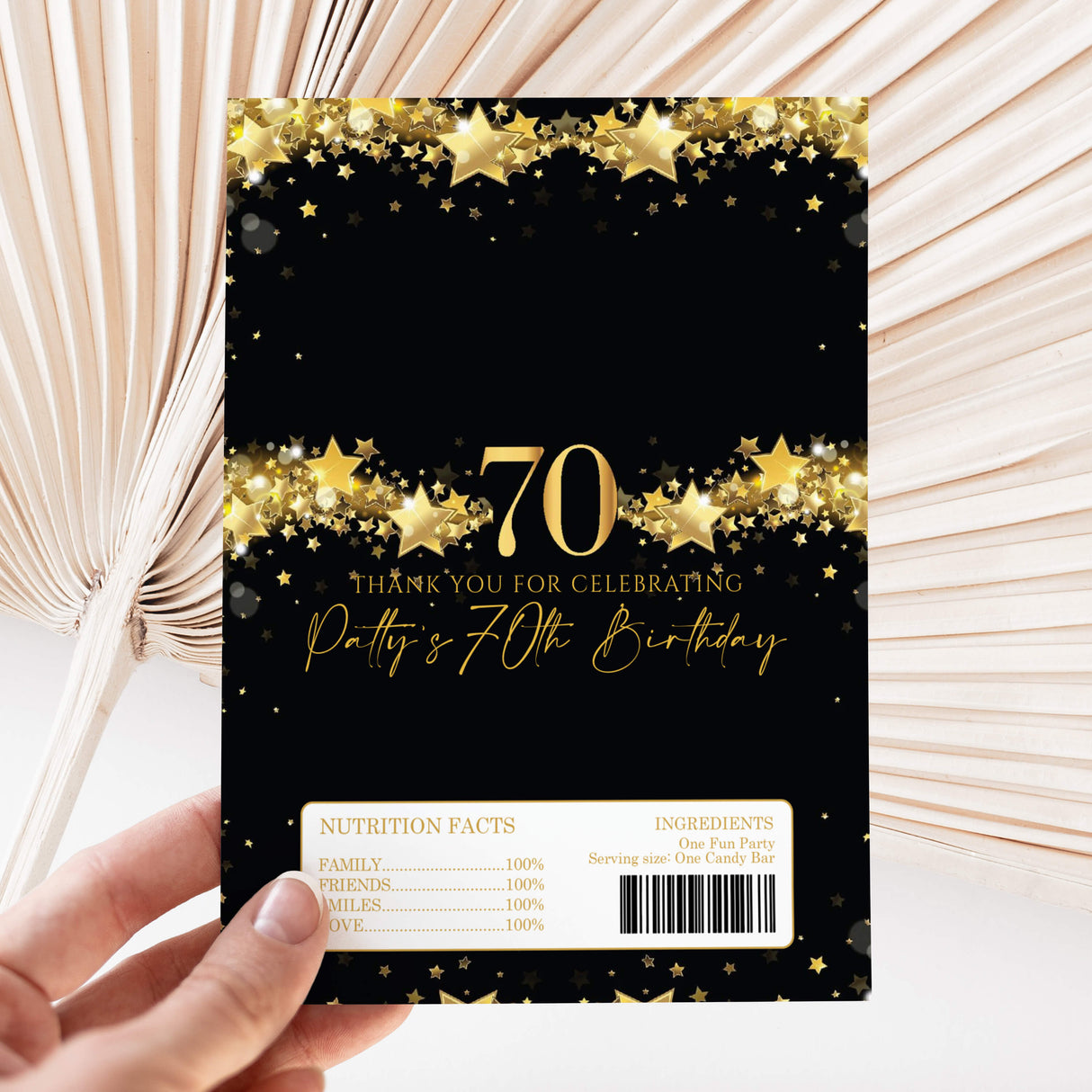 Chocolate wrapper for 70th birthday, black with gold stars, '70' and barcode panel