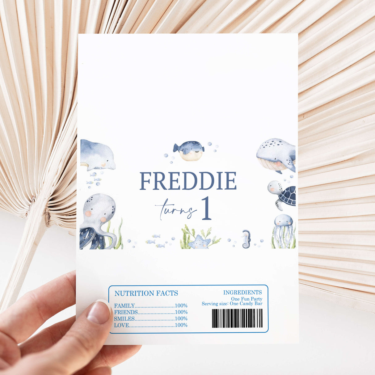 Ocean animal first birthday chocolate wrapper with whale, turtle, jellyfish; “Fredde turns 1”
