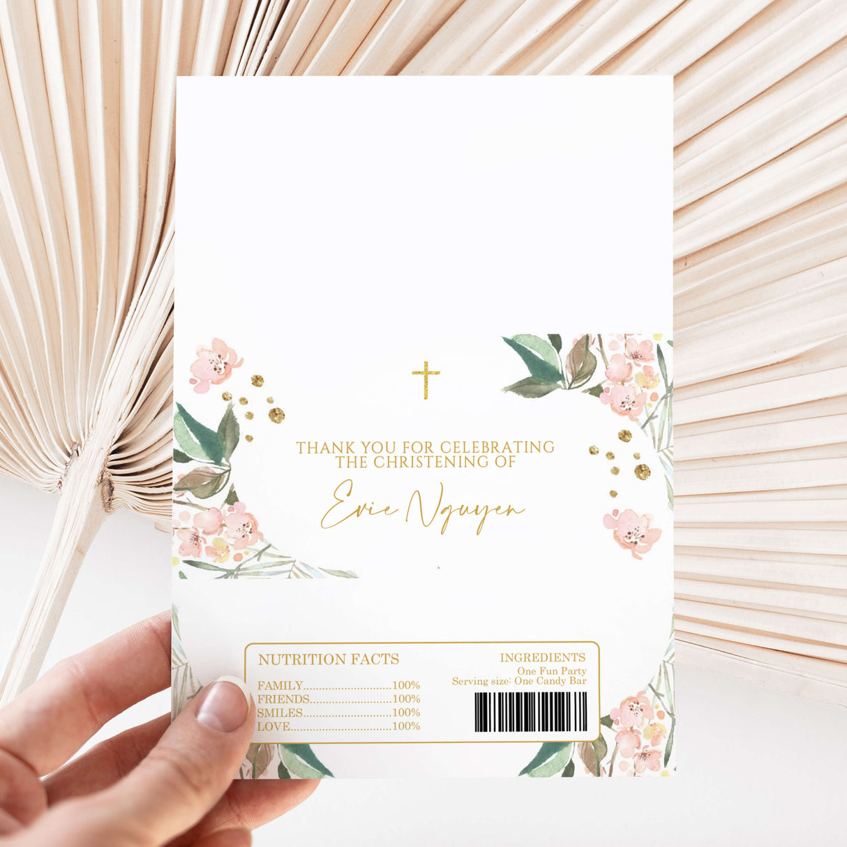 Christening chocolate wrapper sheet with floral pink greenery, gold cross, and thank-you text