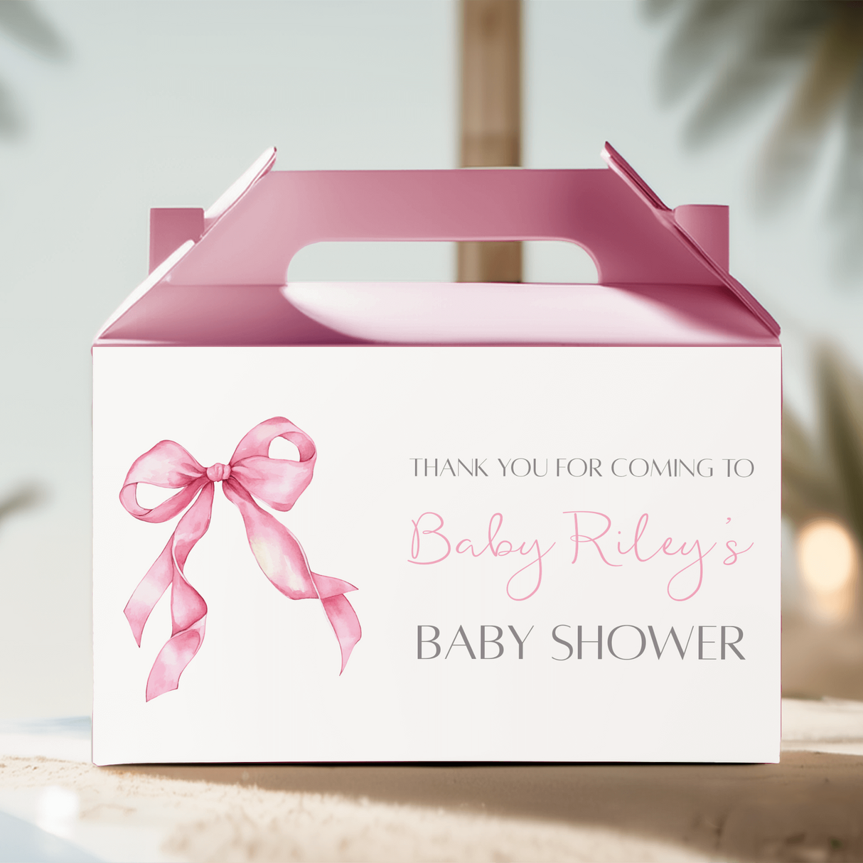 Pink gable favour box with ribbon bow and thank-you baby shower text