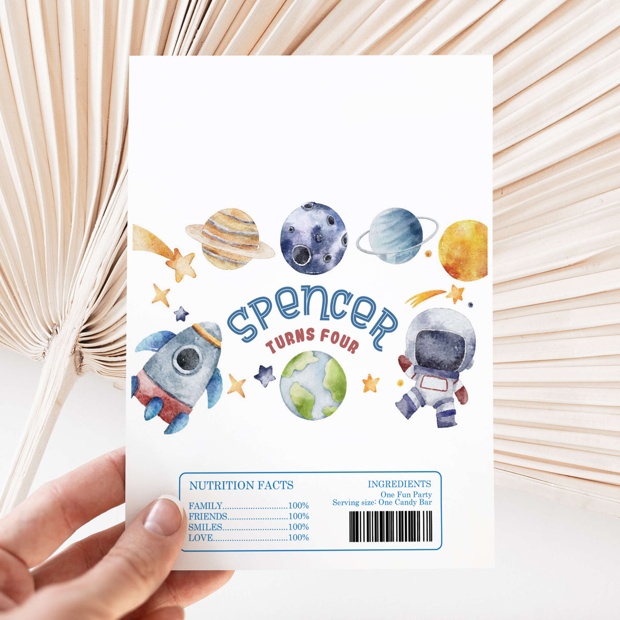 Space astronaut themed chocolate wrapper sheet with planets, rocket, and Spencer